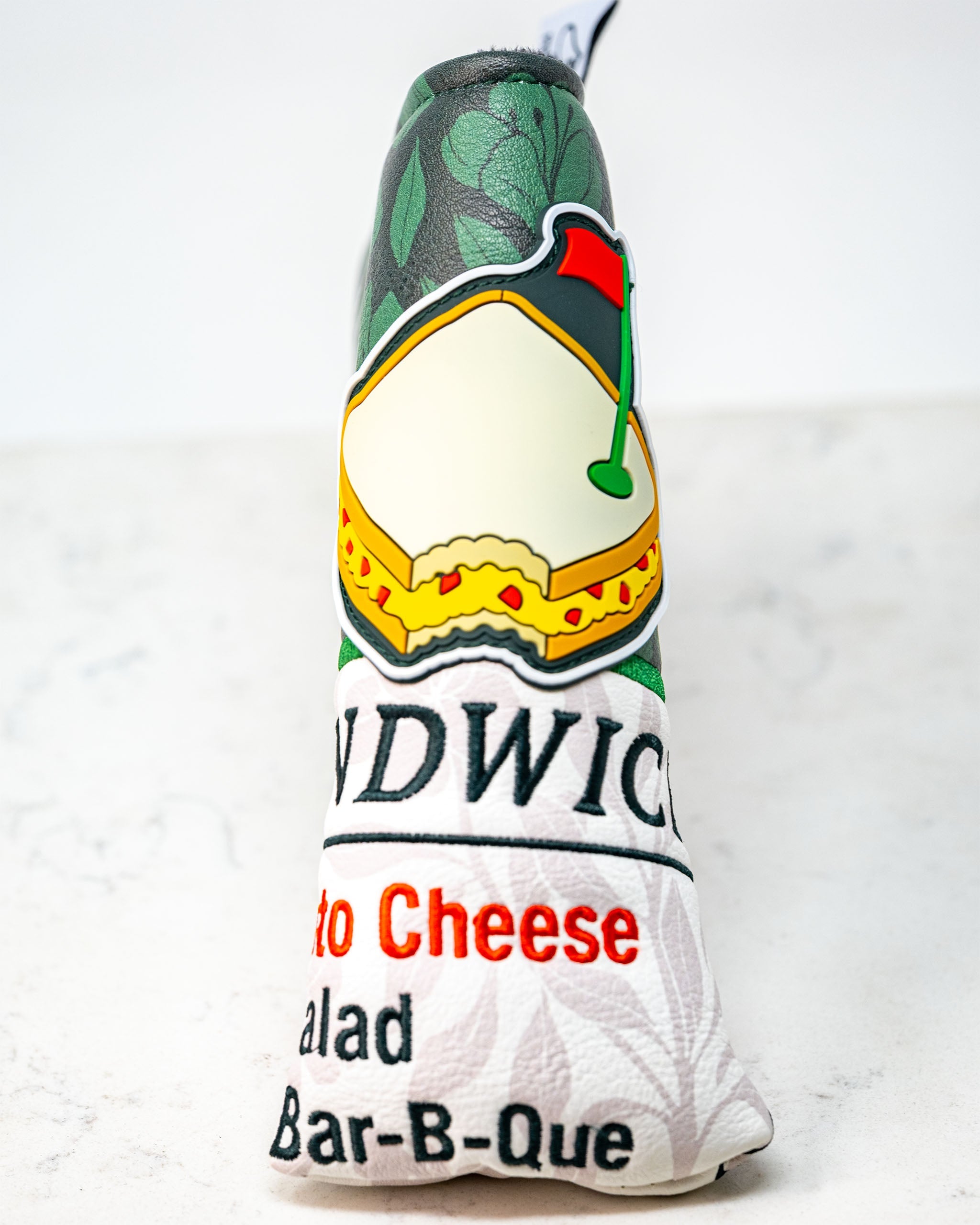 Augusta '25 blade putter cover featuring a vibrant design with a classic look, showcasing intricate details and high-quality materials.