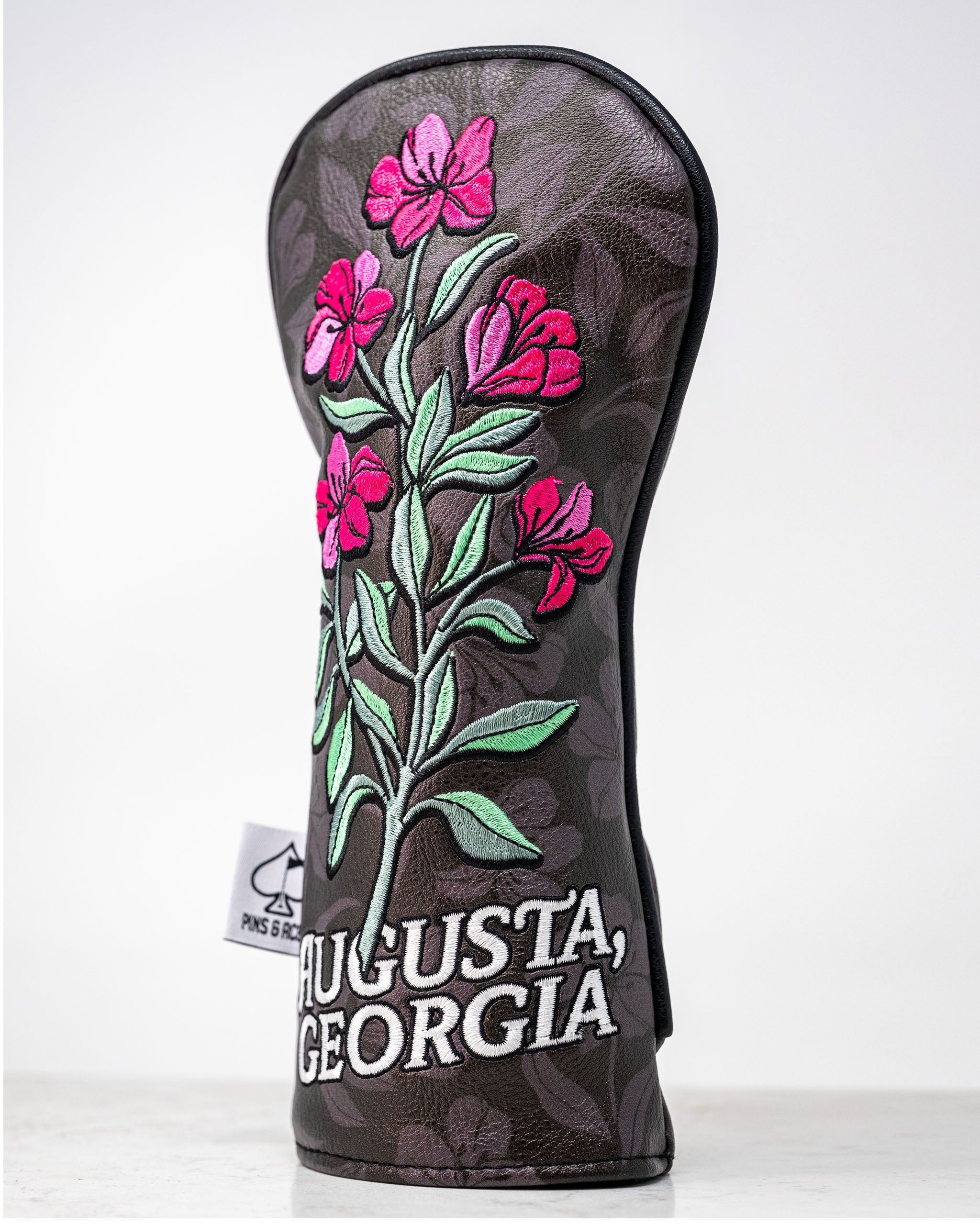 Hibiscus Bloom hybrid golf cover featuring a vibrant floral design in shades of pink and green.