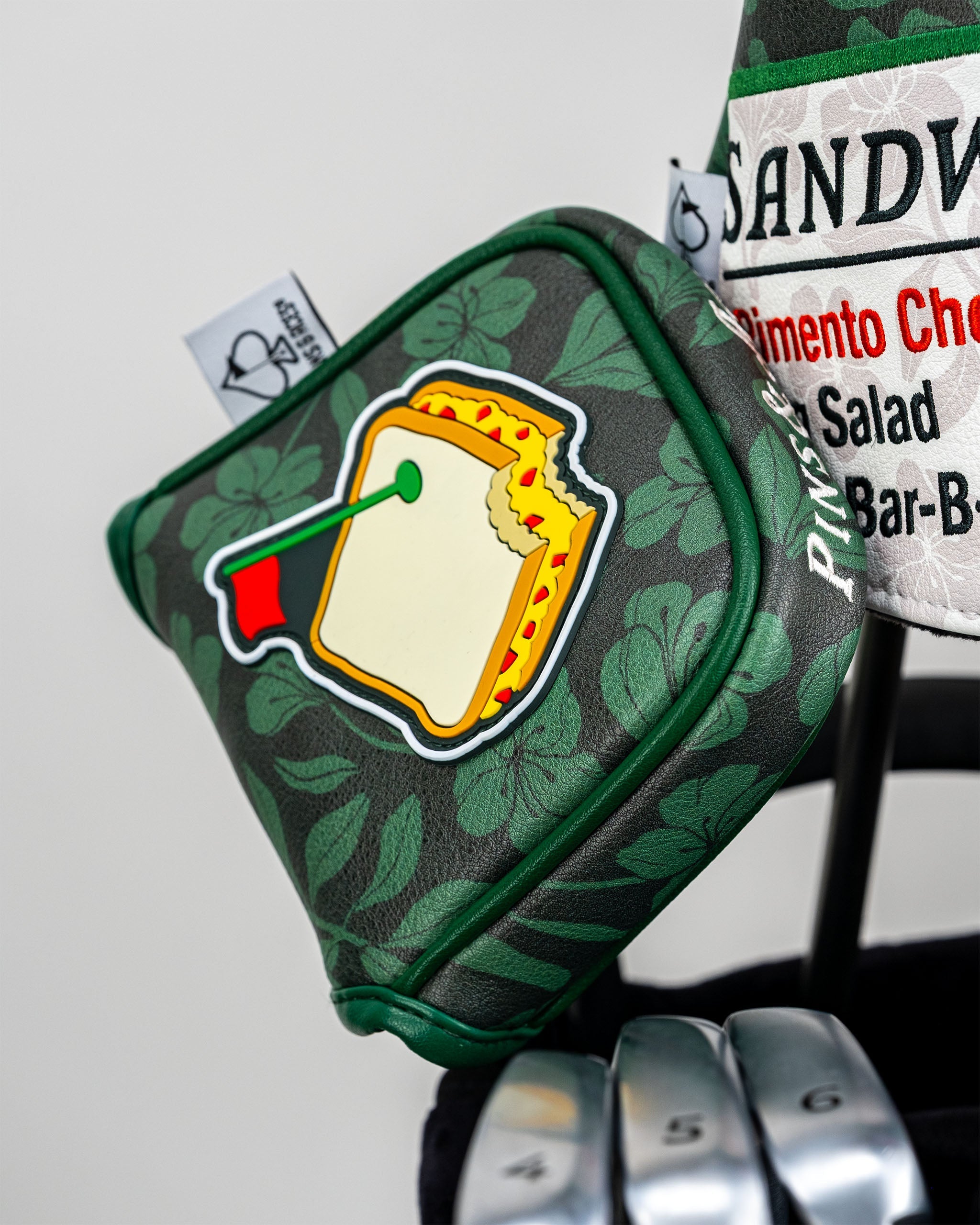 Augusta '25 Mallet Putter Cover in vibrant green with embroidered logo, designed for protection and style on the golf course.