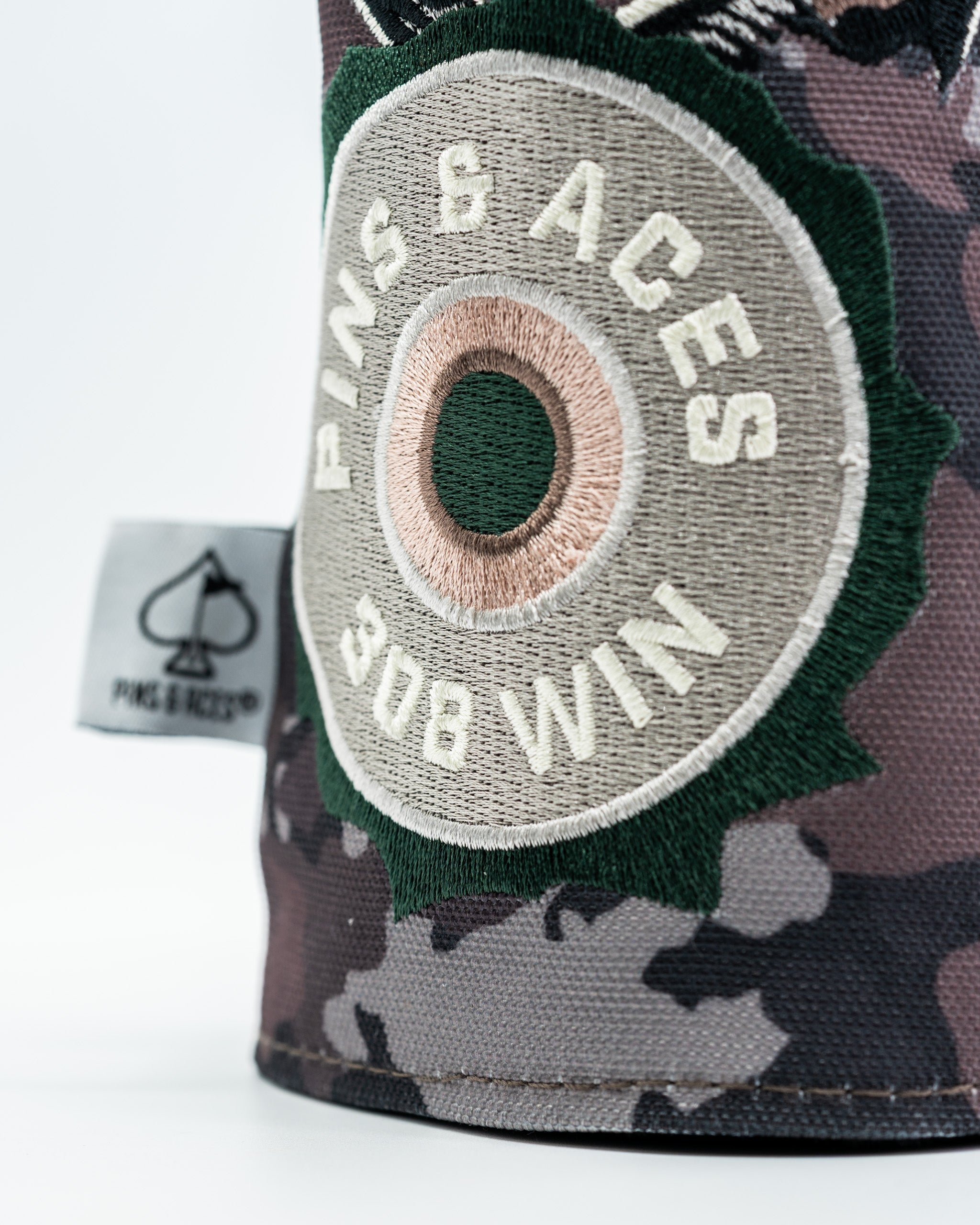 Open Season Bear driver cover featuring a bold camouflage design and embroidered logo for stylish golf protection.