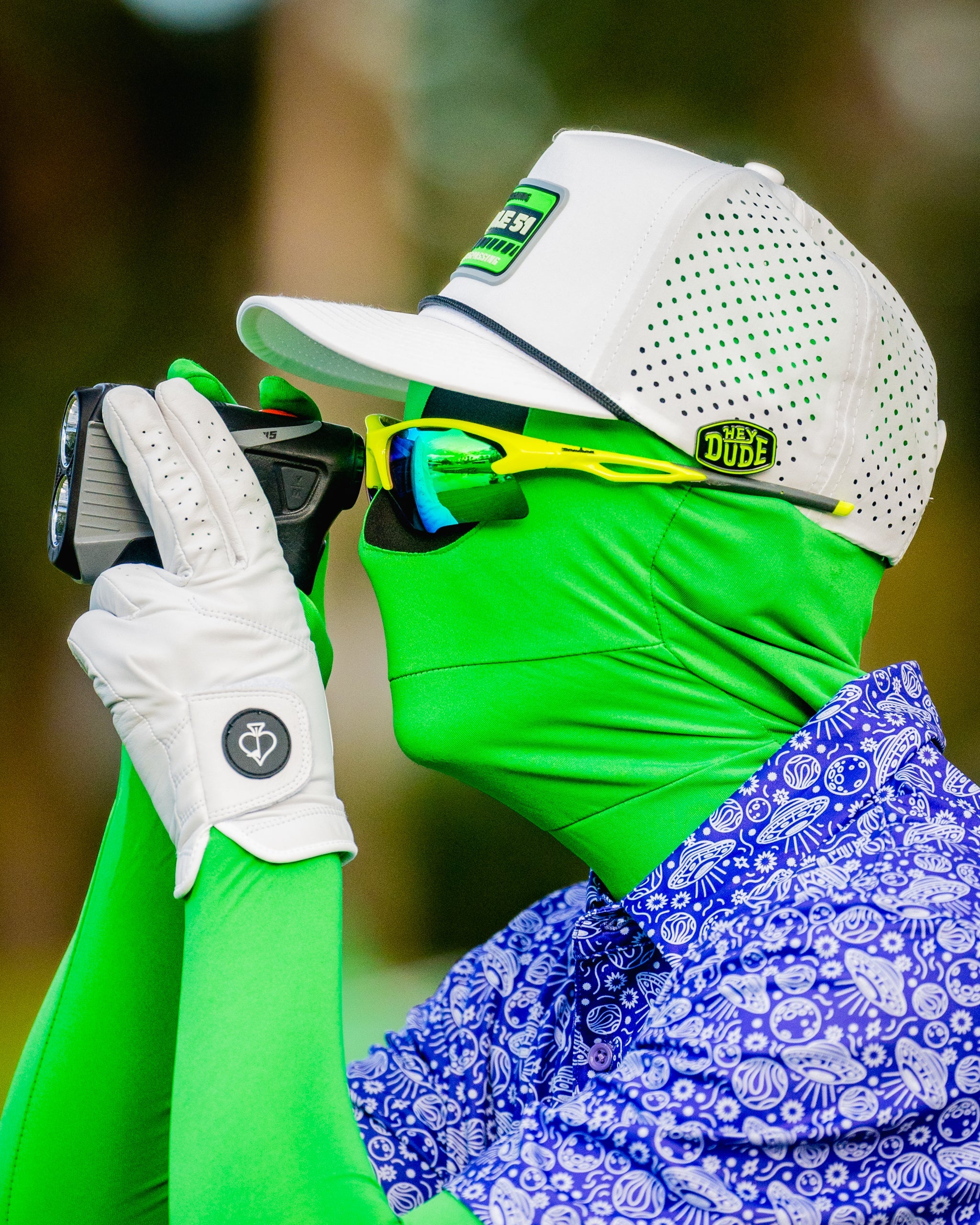 HEYDUDE logo ball marker with a sleek design, ideal for golf enthusiasts.