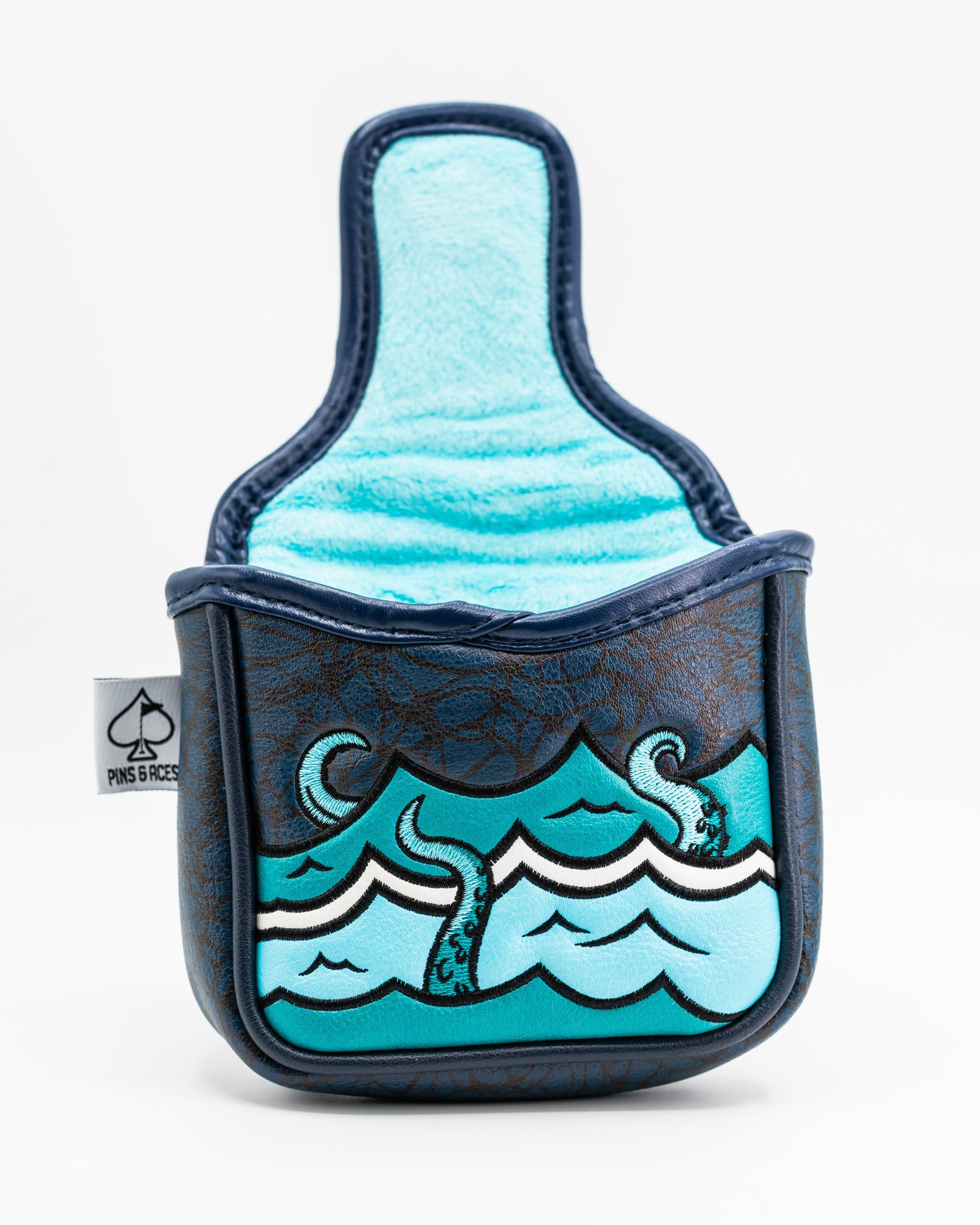 Kraken mallet putter cover featuring a blue ocean wave design with tentacles, lined with soft turquoise fabric.