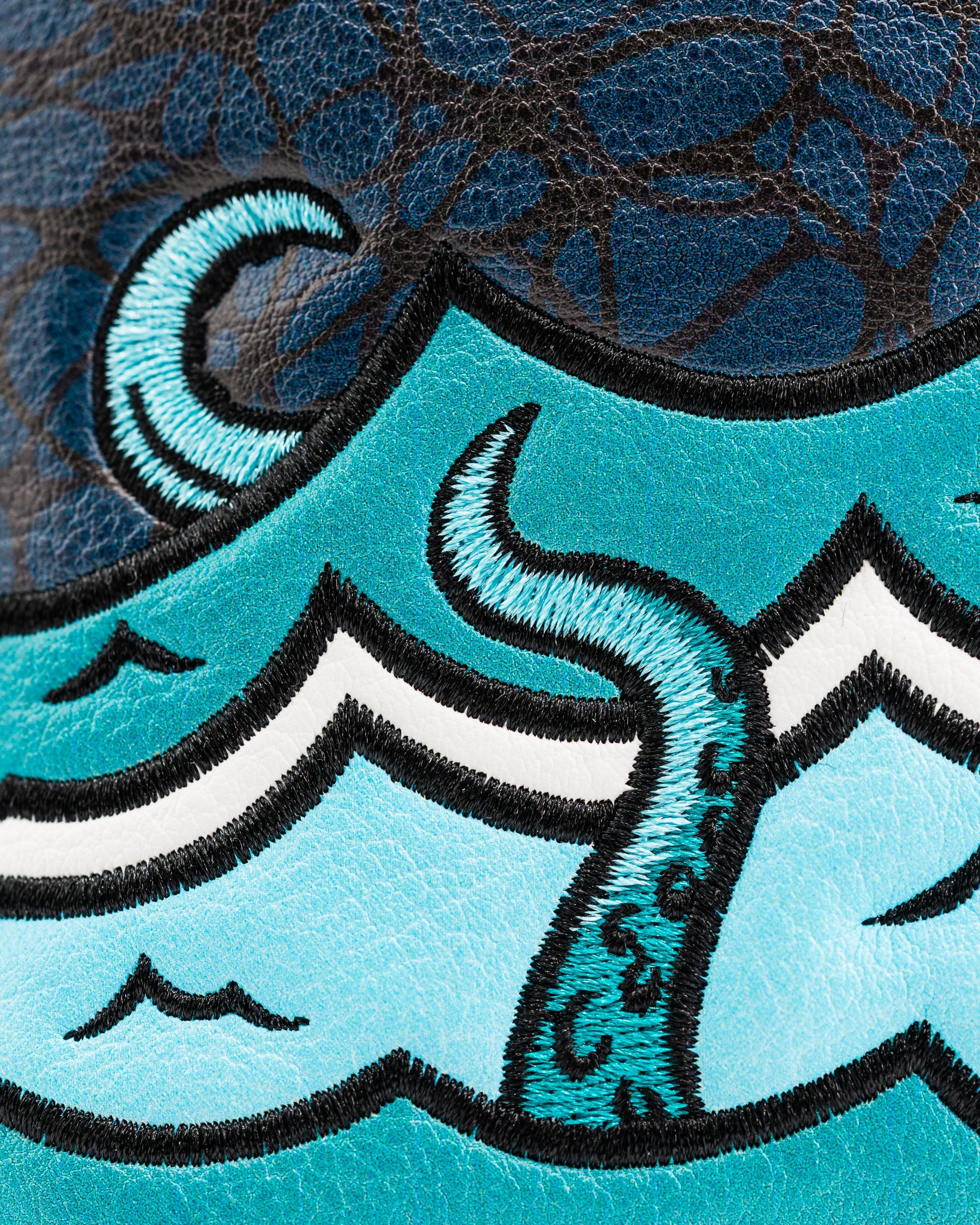 Mallet putter cover featuring a detailed Kraken design with turquoise waves and tentacles on a textured background.