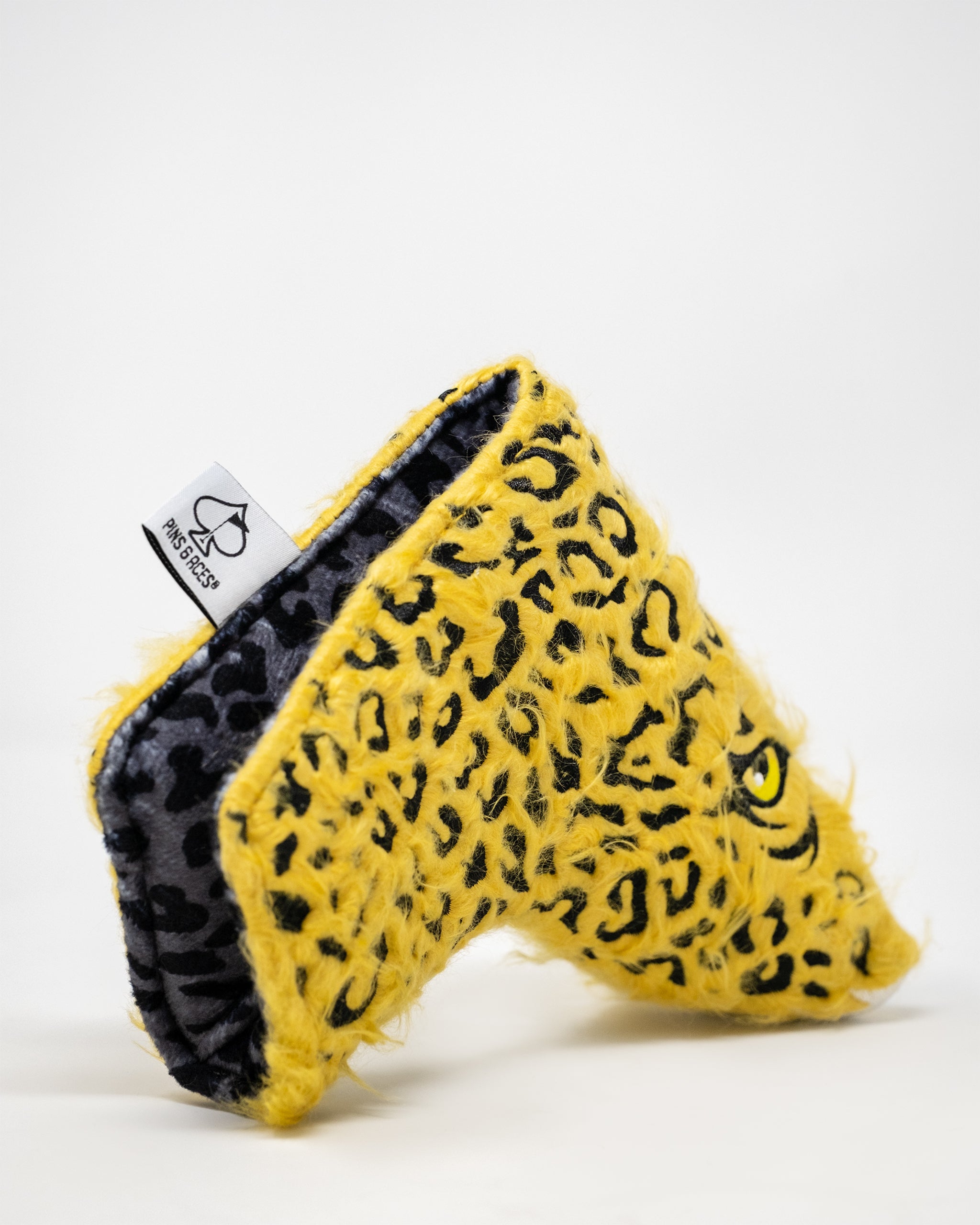 Leopard print blade putter cover with magnetic closure for golf clubs.