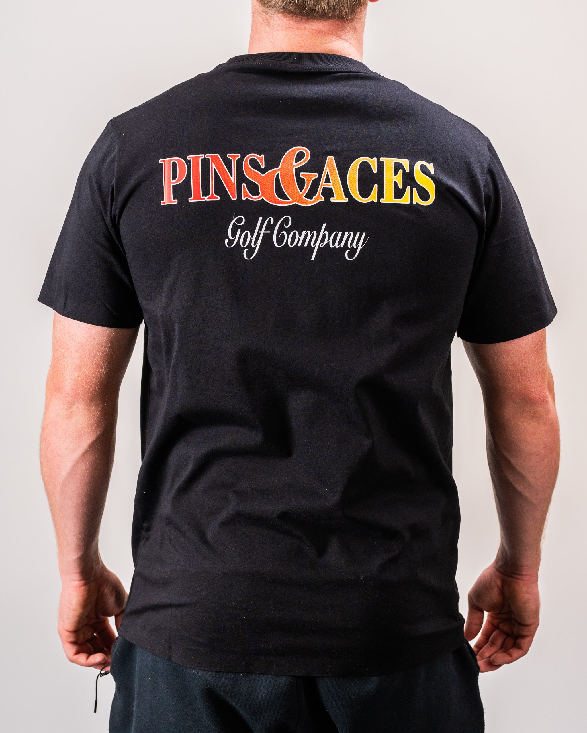 Half&Half Tee featuring a split design with contrasting colors, displayed on a model against a natural outdoor background.