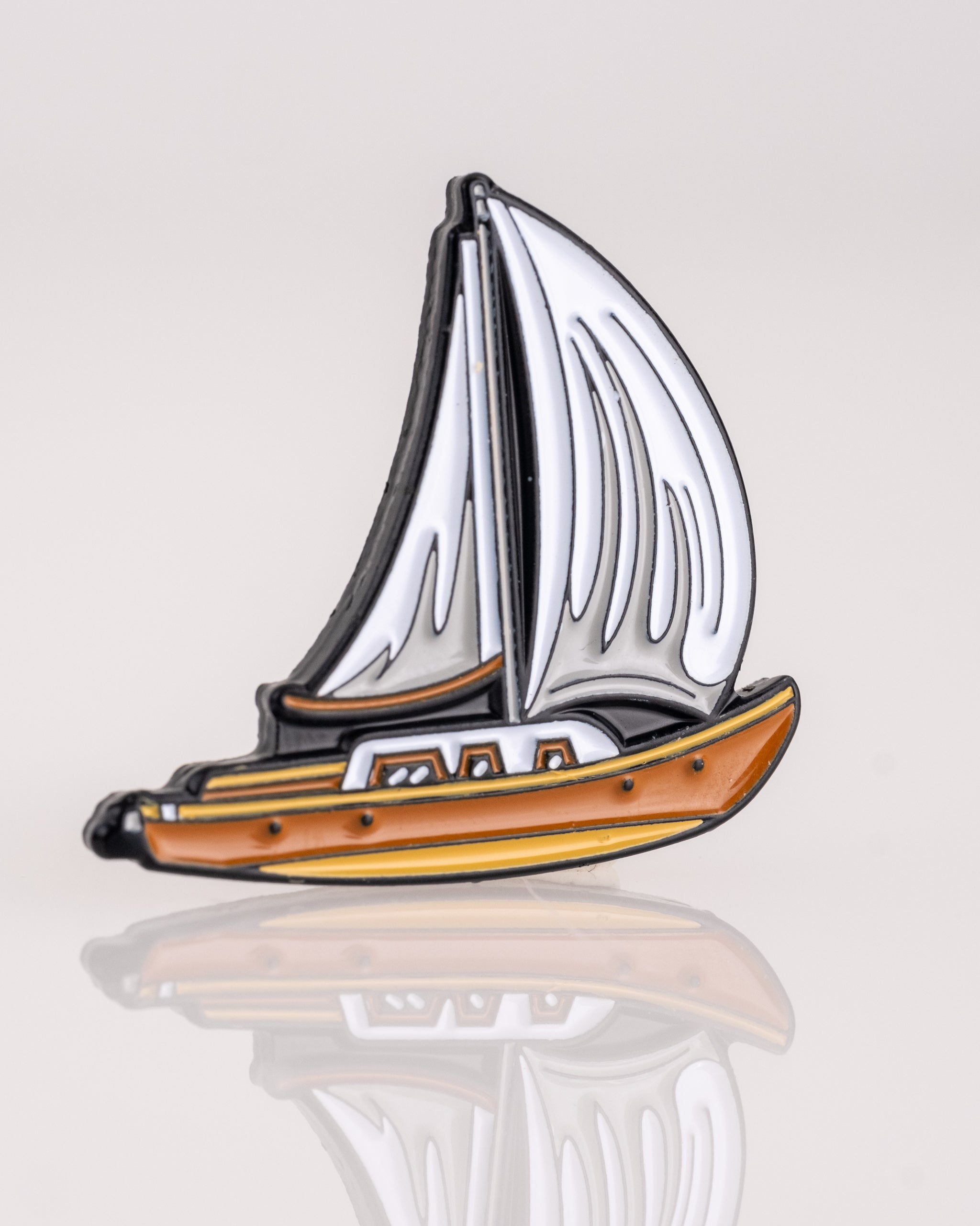 Margaritaville sailboat ball marker featuring a colorful, detailed design, perfect for golf enthusiasts.