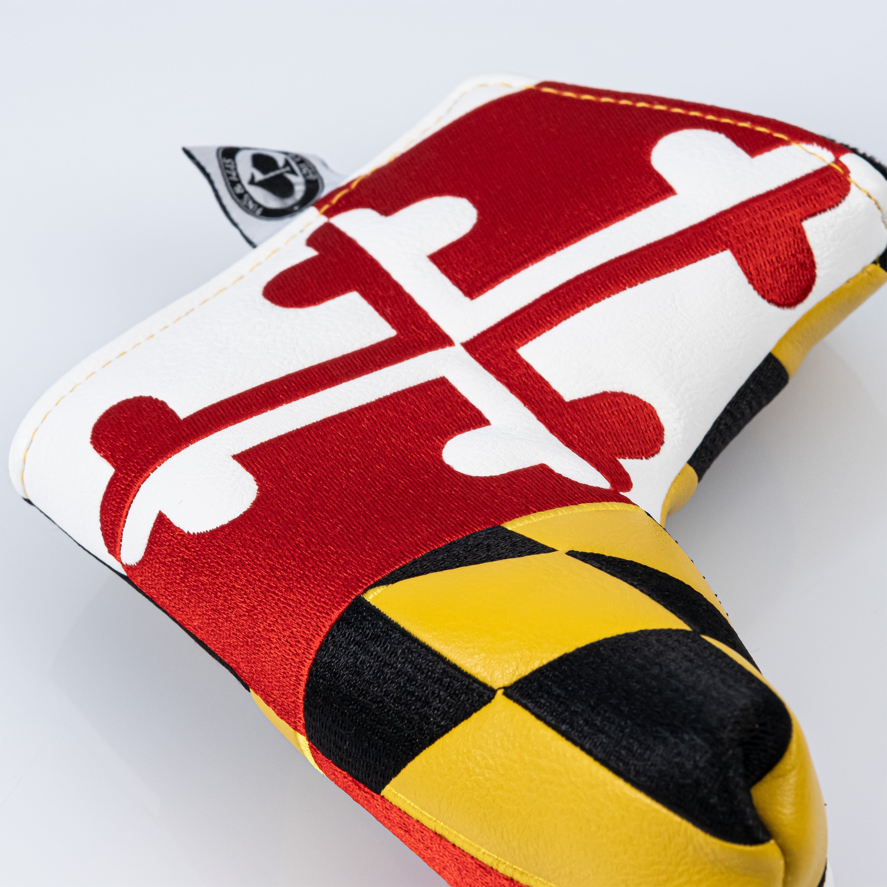 Maryland Blade Putter Cover featuring a side detail design with the Maryland state flag colors.