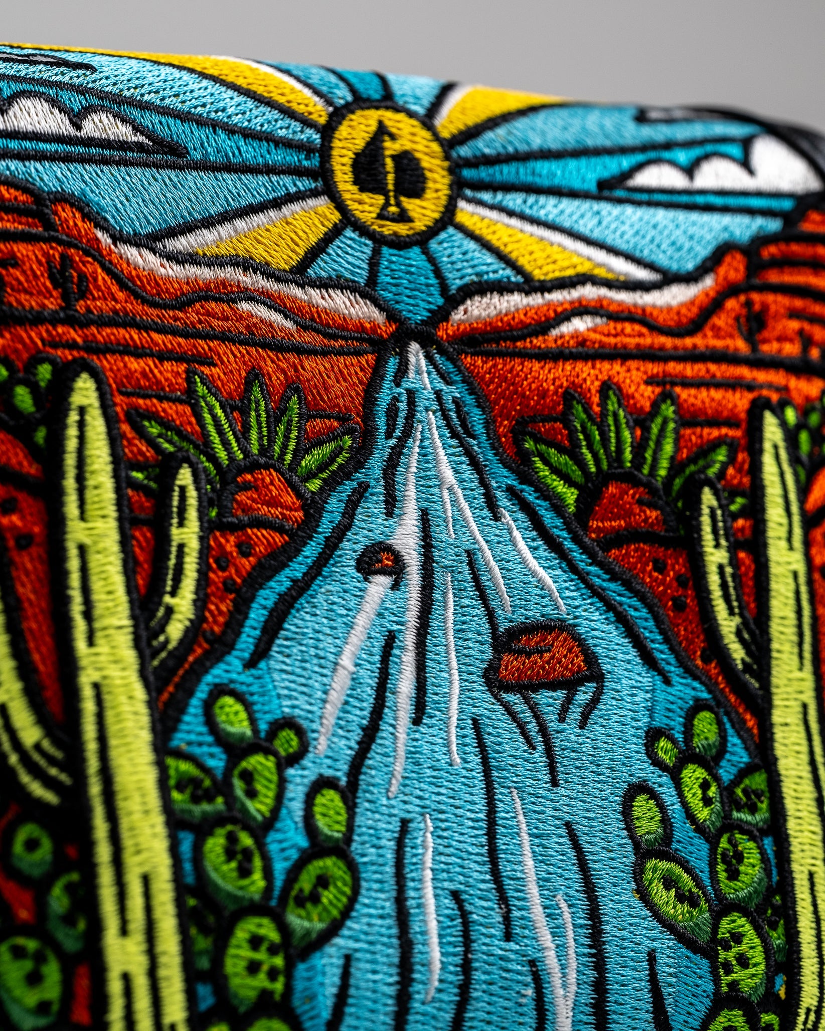 Mojave mallet putter cover in a colorful desert pattern with a stitched logo.