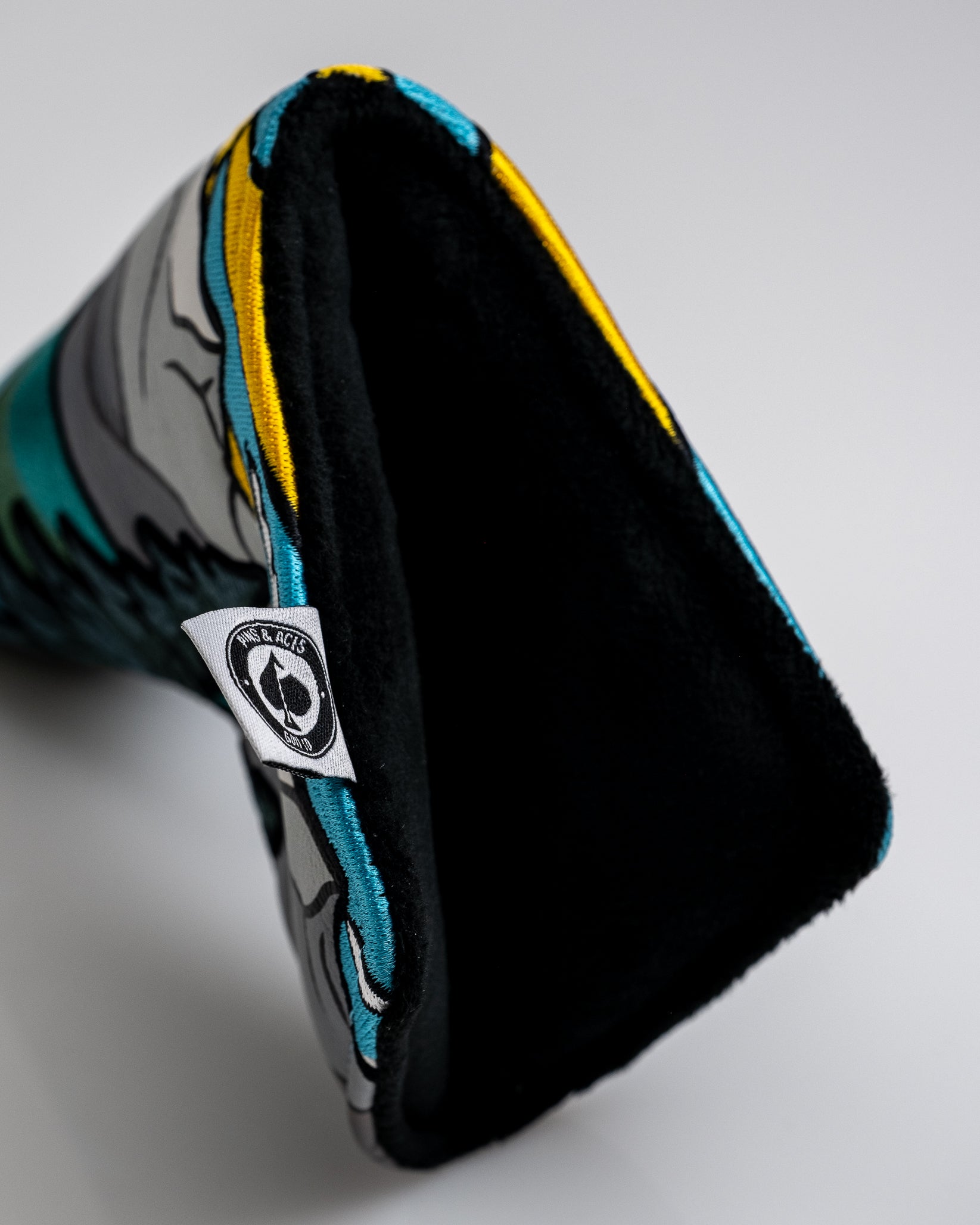 Colorful golf headcover with bold graphic design, black interior, and "Ping & Acis" logo tag. Perfect for standing out on ...