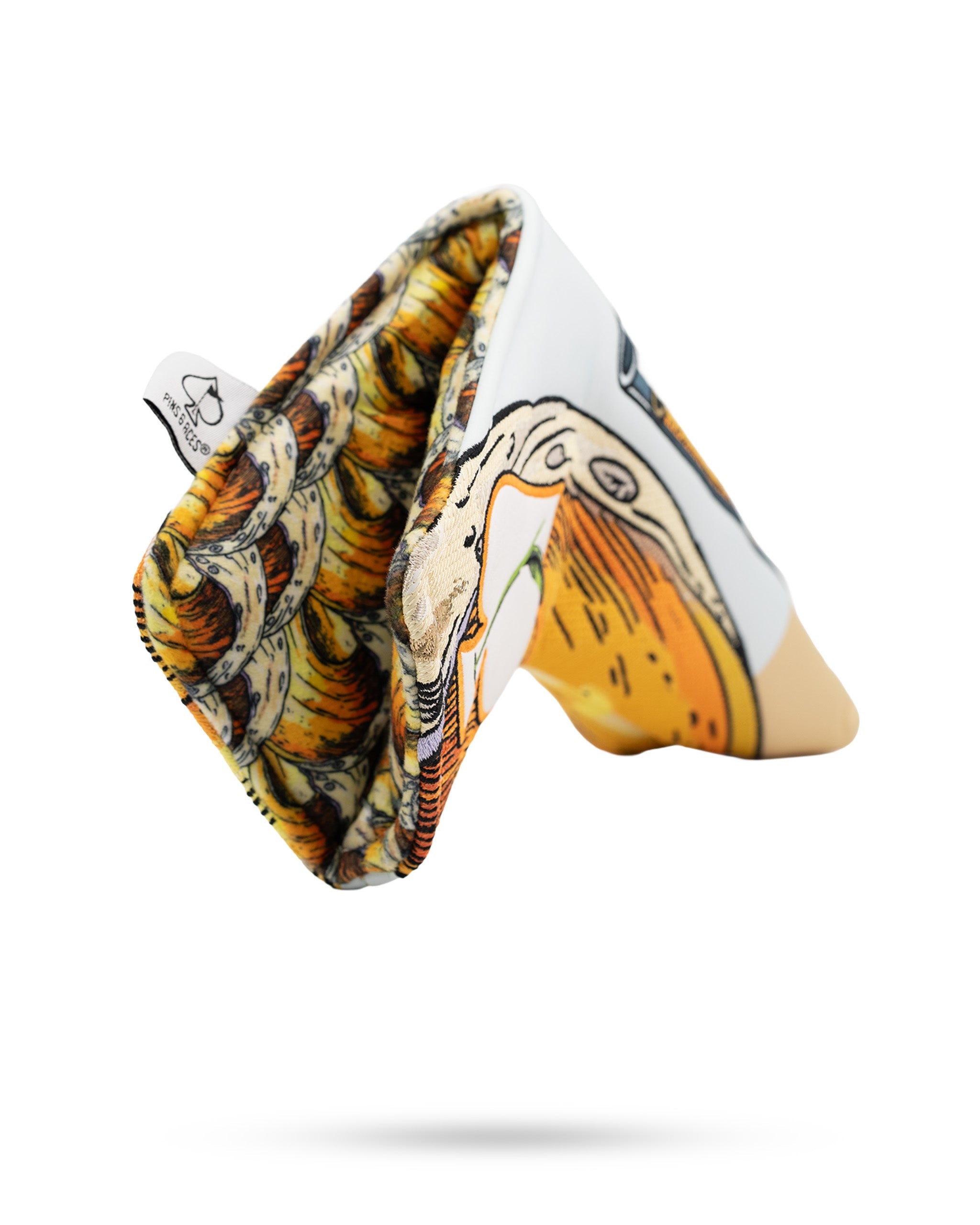 Colorful blade putter cover featuring a whimsical mimosa design, perfect for adding style to your golf game.