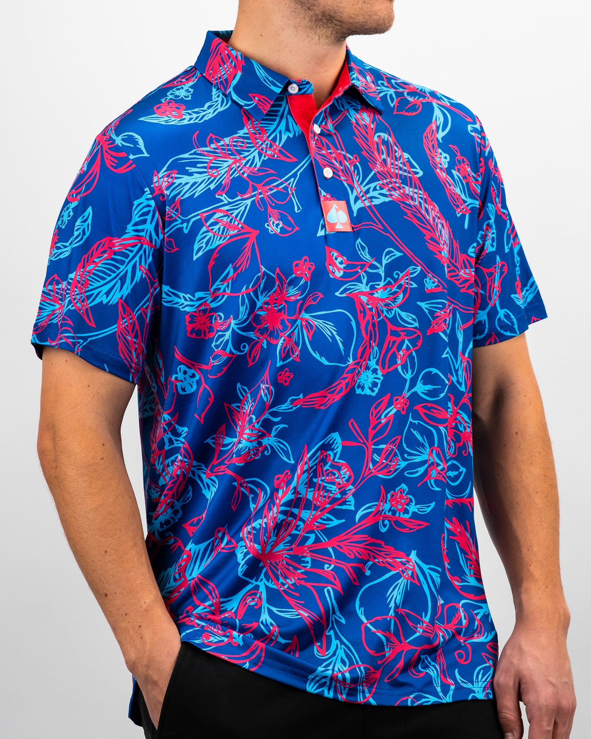 Retro Cabo Colada polo shirt in vibrant colors featuring a tropical design and short sleeves.