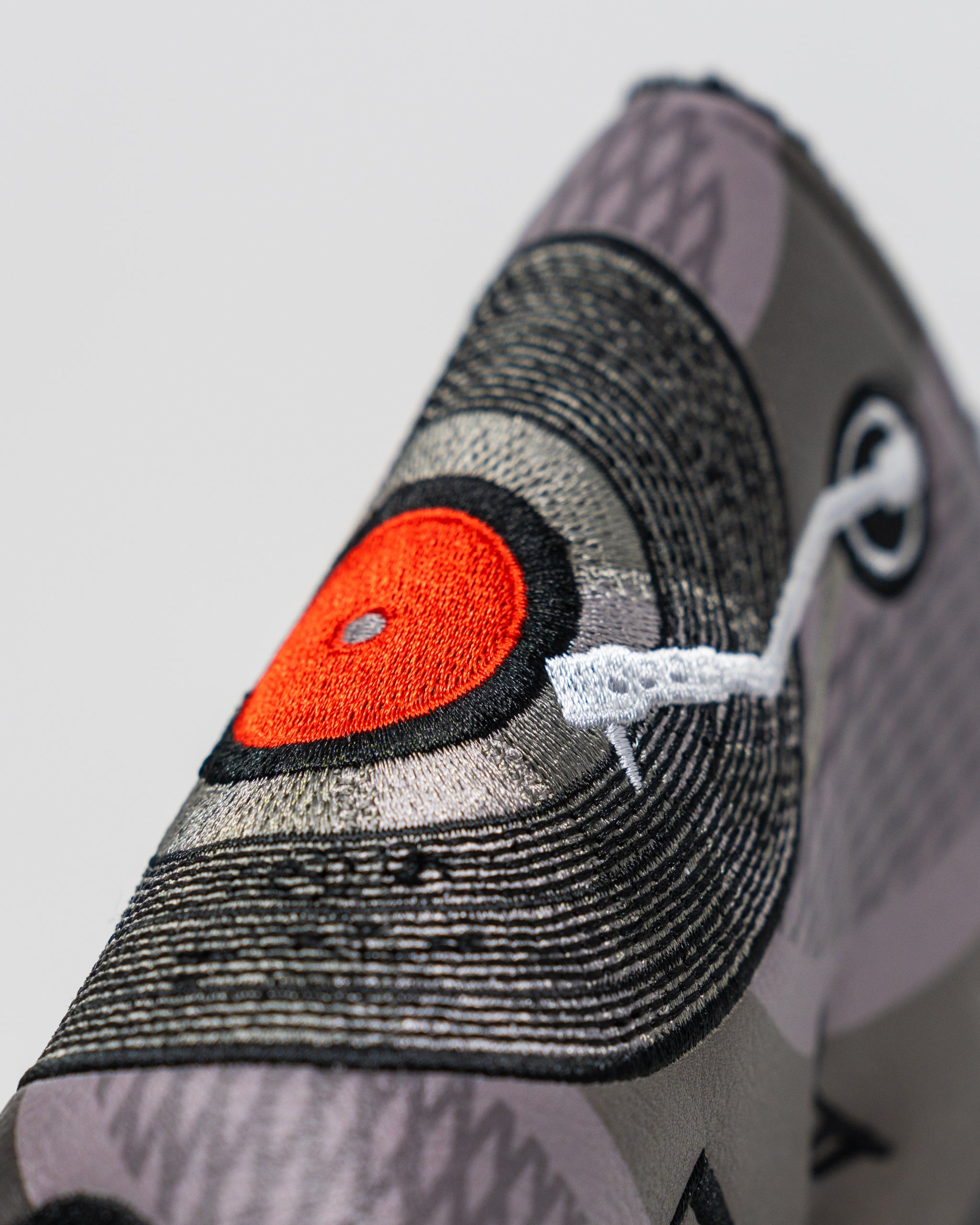 Music City Blade Putter Cover featuring a vibrant design with a guitar motif, suitable for standard blade putters.