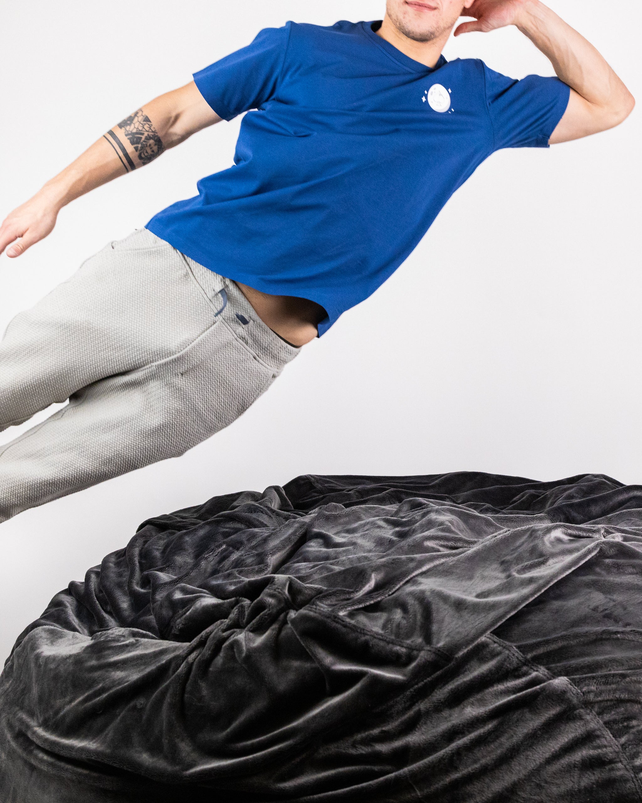 White NASA tee shirt featuring the iconic NASA logo printed in red and blue.