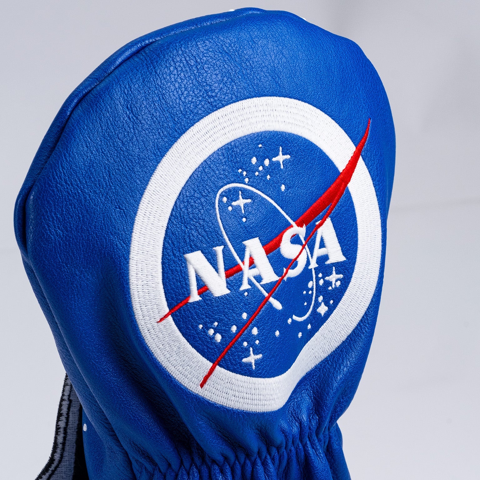 NASA Space Shuttle driver cover featuring a detailed graphic of the shuttle in launch position, designed for automotive use.