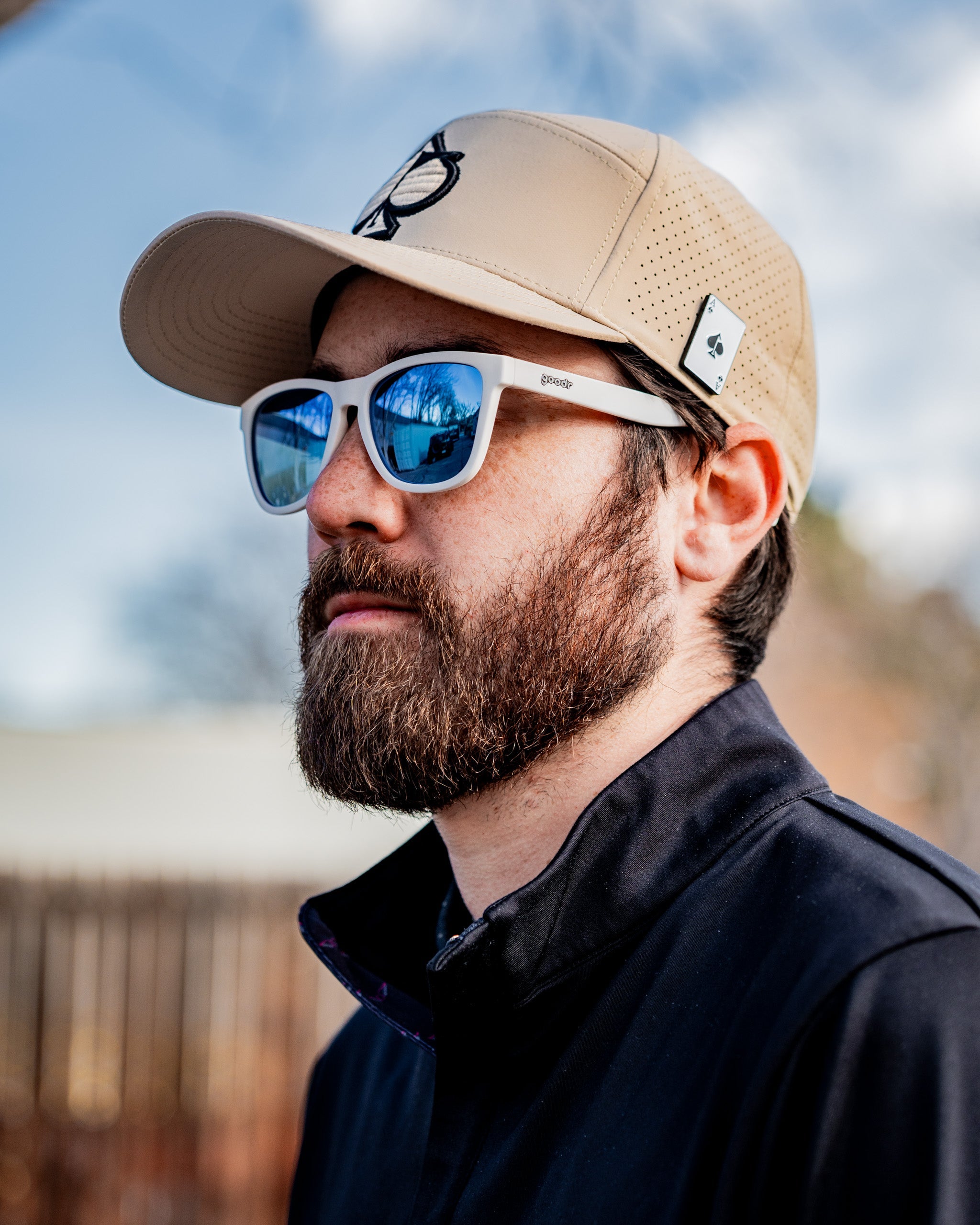 Tradesman hat in sand color, featuring a wide brim and decorative band, displayed against a neutral background.