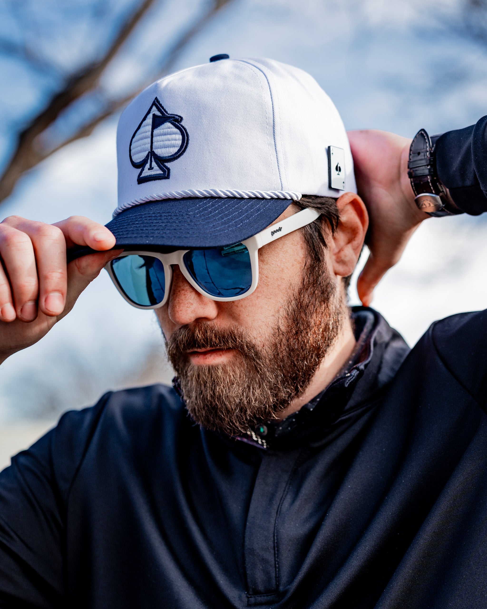 Heritage Rope Hat in Admiral color with a decorative rope detail and embroidered logo on the front.