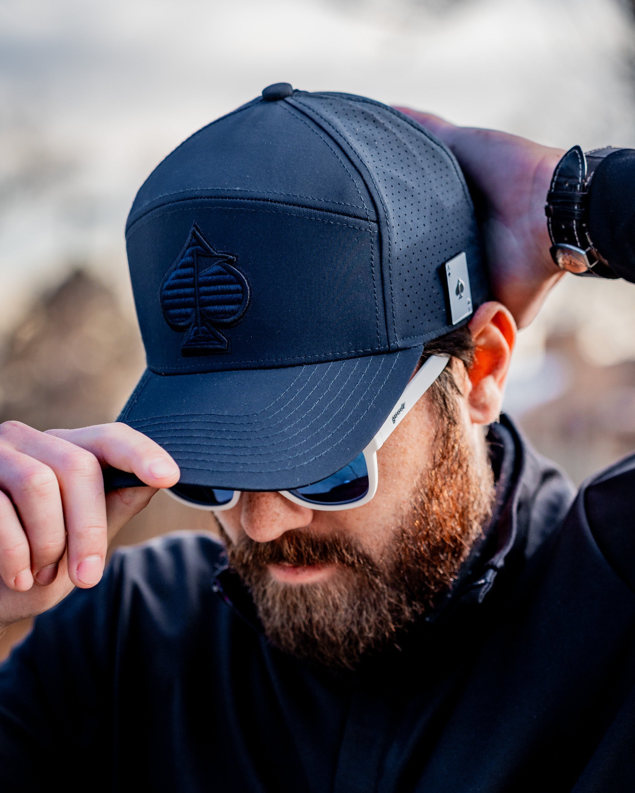 Navy Tradesman Hat with a structured crown and adjustable strap.