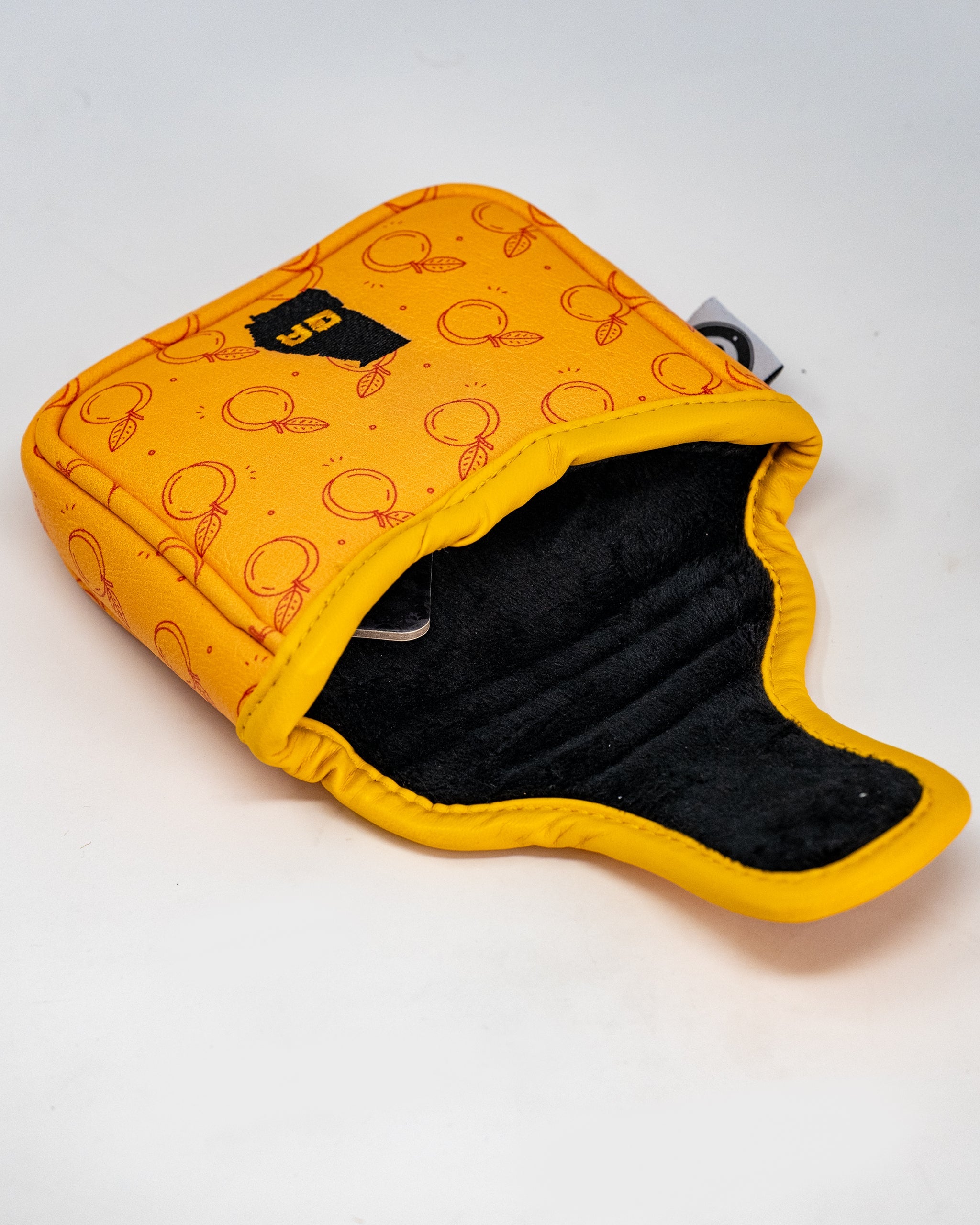 Dawg Country mallet cover featuring a colorful dog design, ideal for protecting golf putters.