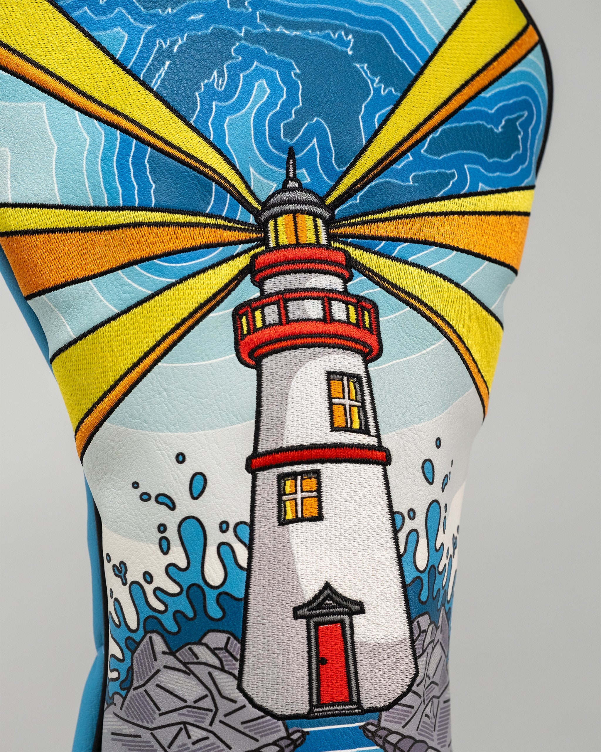 Great Lakes Driver Cover featuring a colorful design depicting the Great Lakes region.