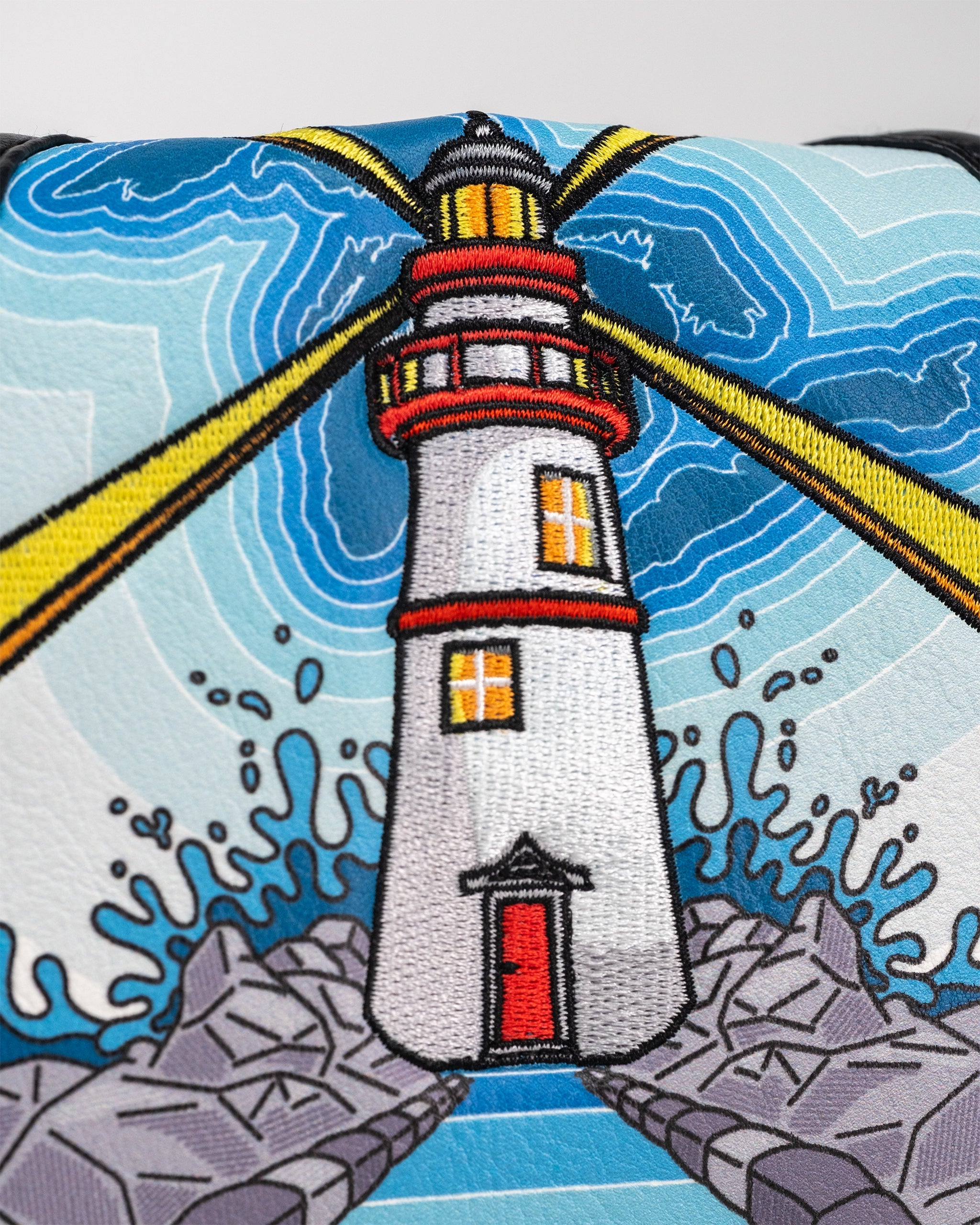 Great Lakes Mallet Putter Cover featuring a unique design with vibrant colors and intricate graphics, ideal for protecting mallet-style putters.