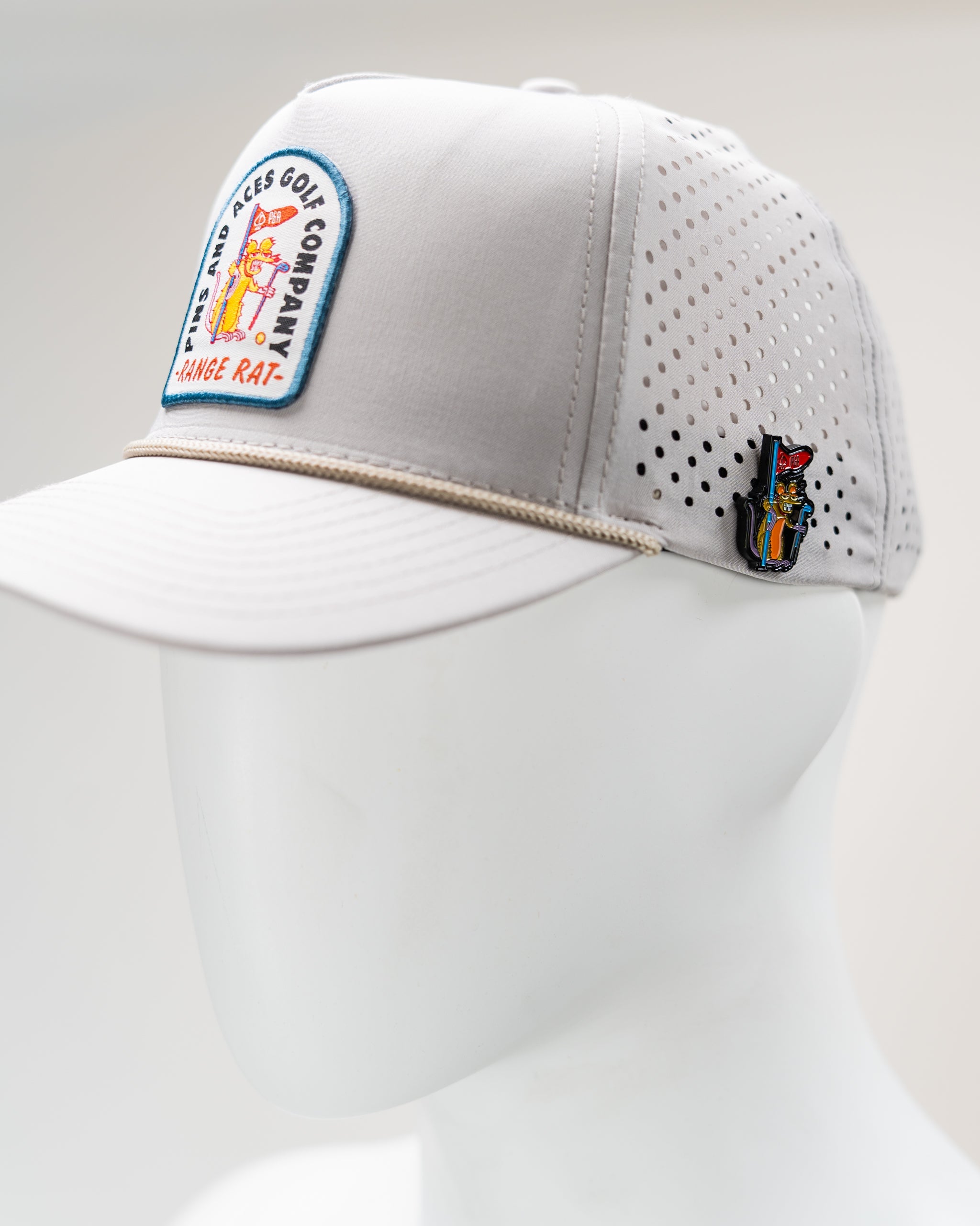 Perforated Rope Hat in Bone color, featuring a stylish Range Rat logo and adjustable fit.