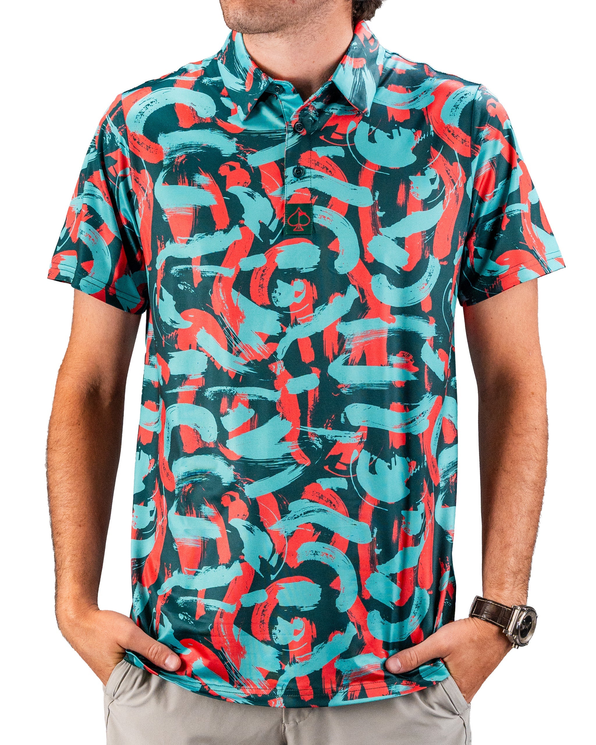 Bold golf polo featuring a vibrant coral and teal paint stroke pattern, perfect for standing out on the course.