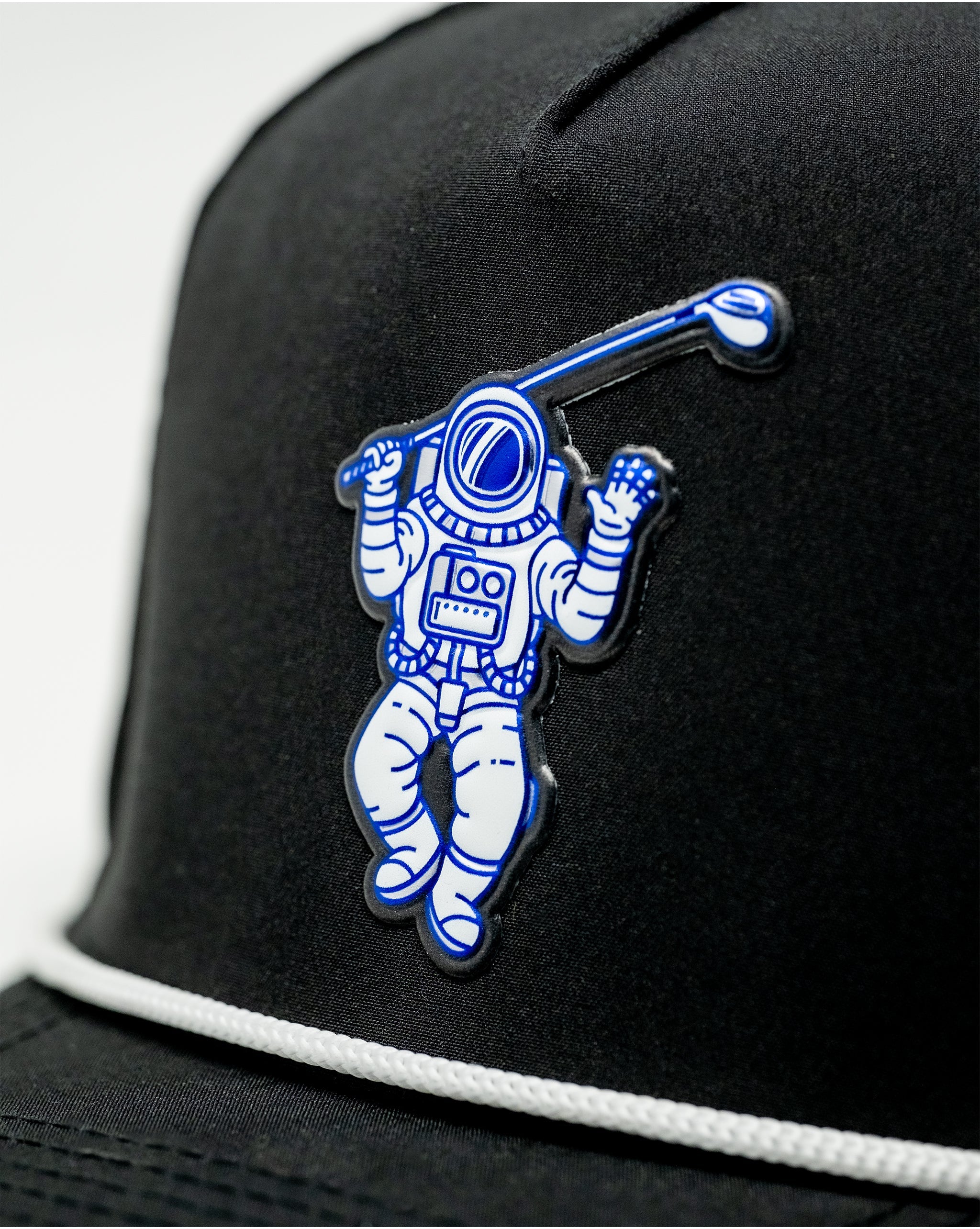 Black perforated rope hat featuring "Space Golfer" design.
