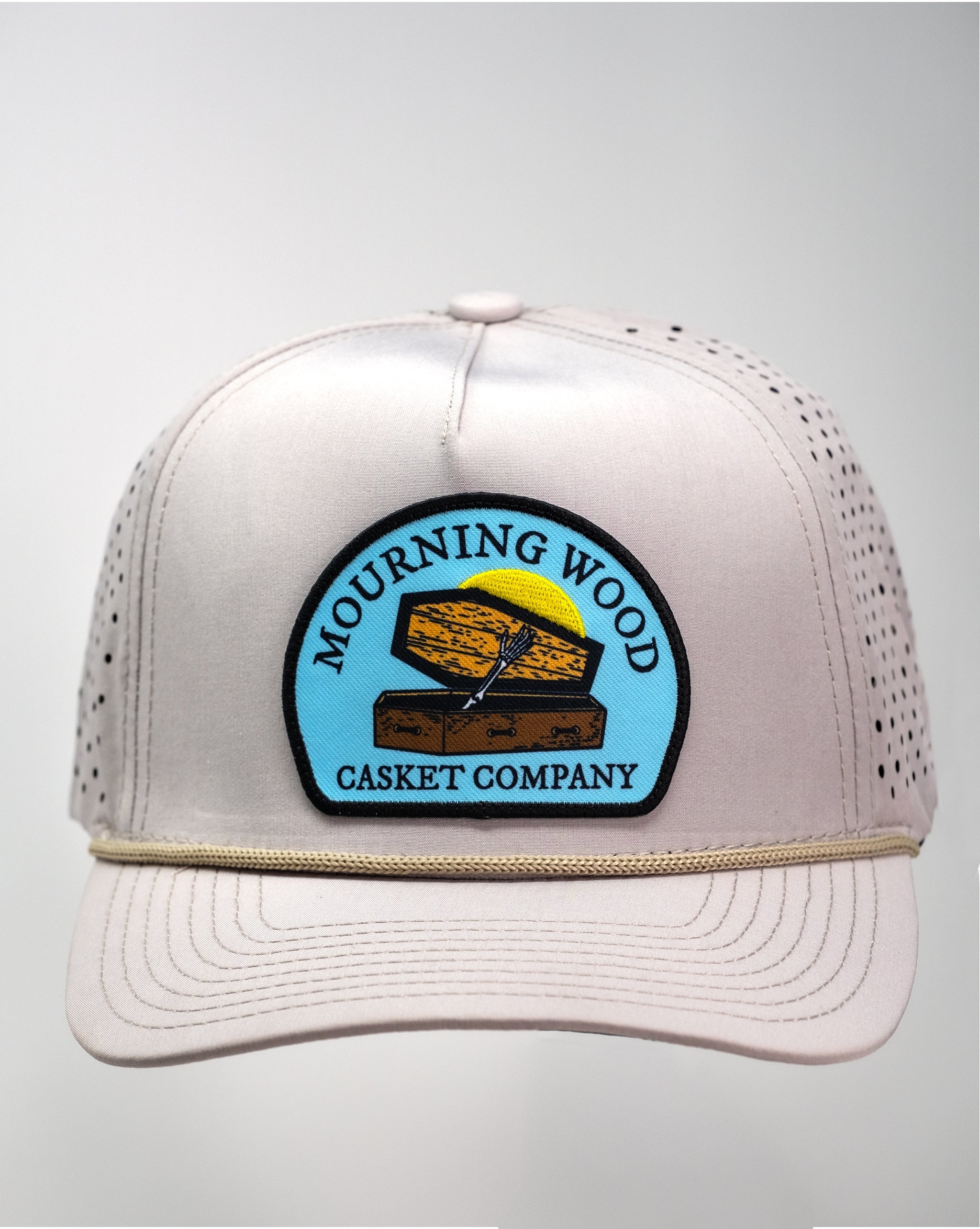 Perforated Rope Hat in Mourning Wood and Bone colors, featuring a stylish design with a rope accent.