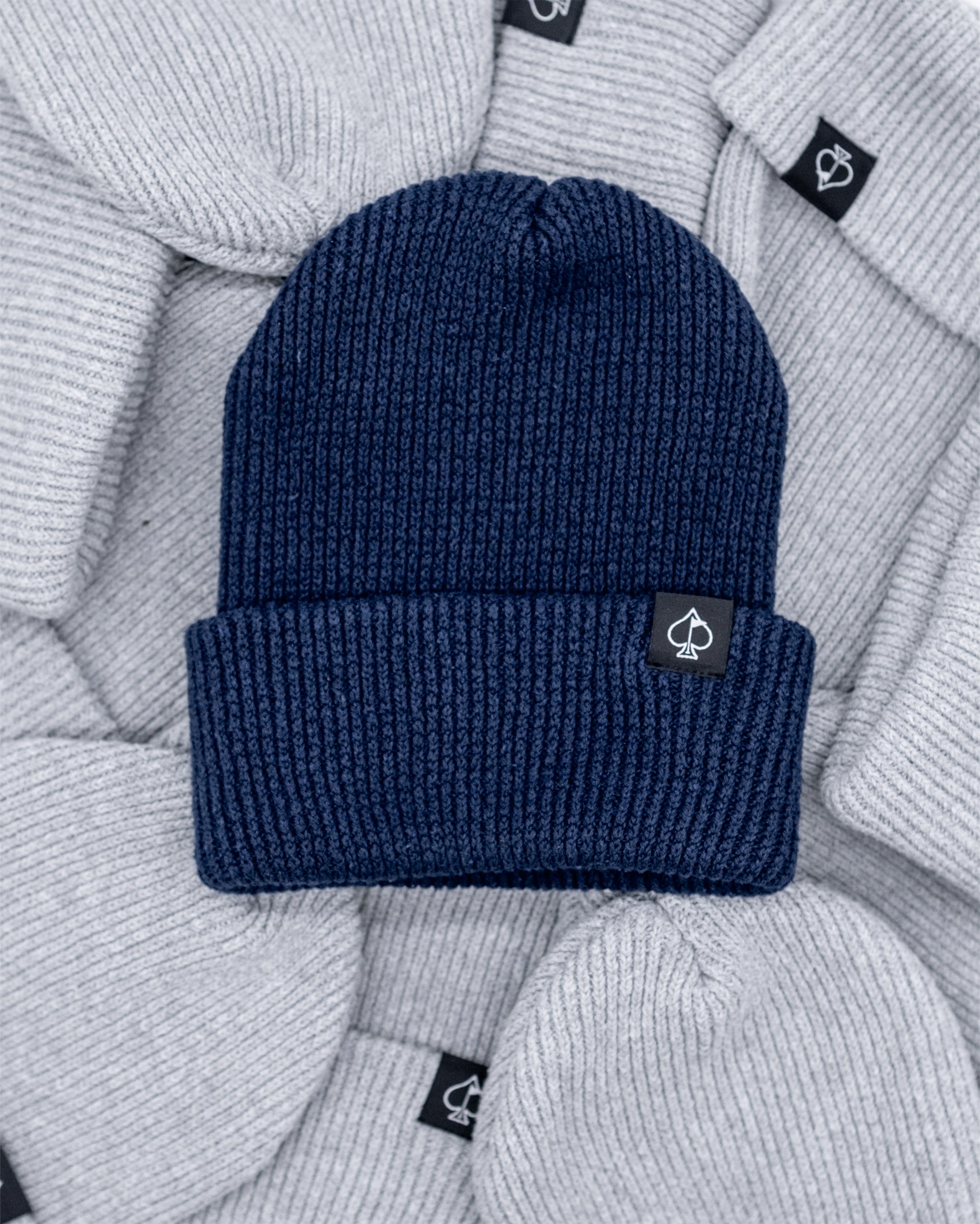 Player Preferred™ Spade Beanie in gray, featuring a stylish spade logo and a cozy knit design.
