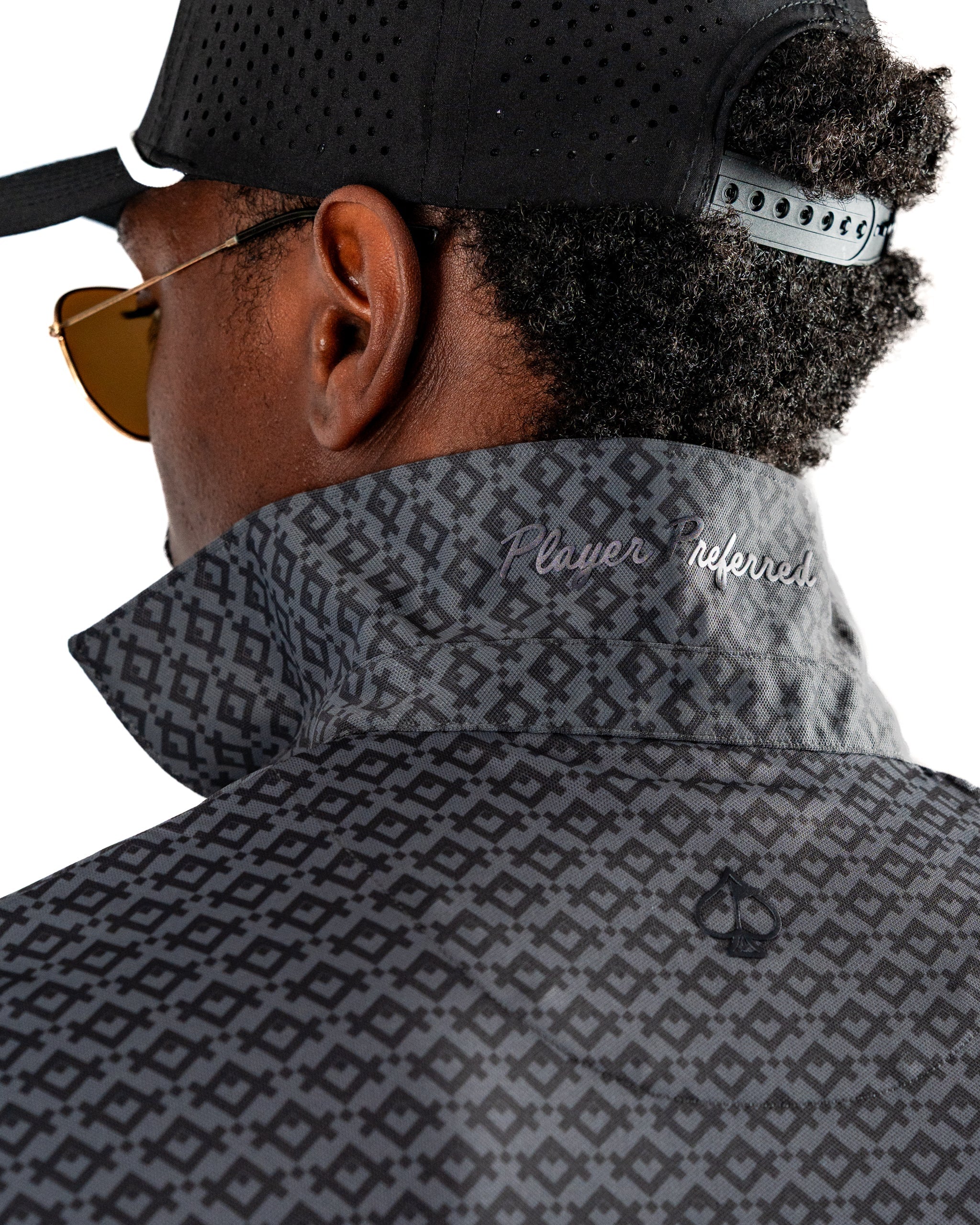 Men's Slate Mosaic golf jacket featuring a stylish geometric pattern and "Player Preferred" embroidery on the collar.