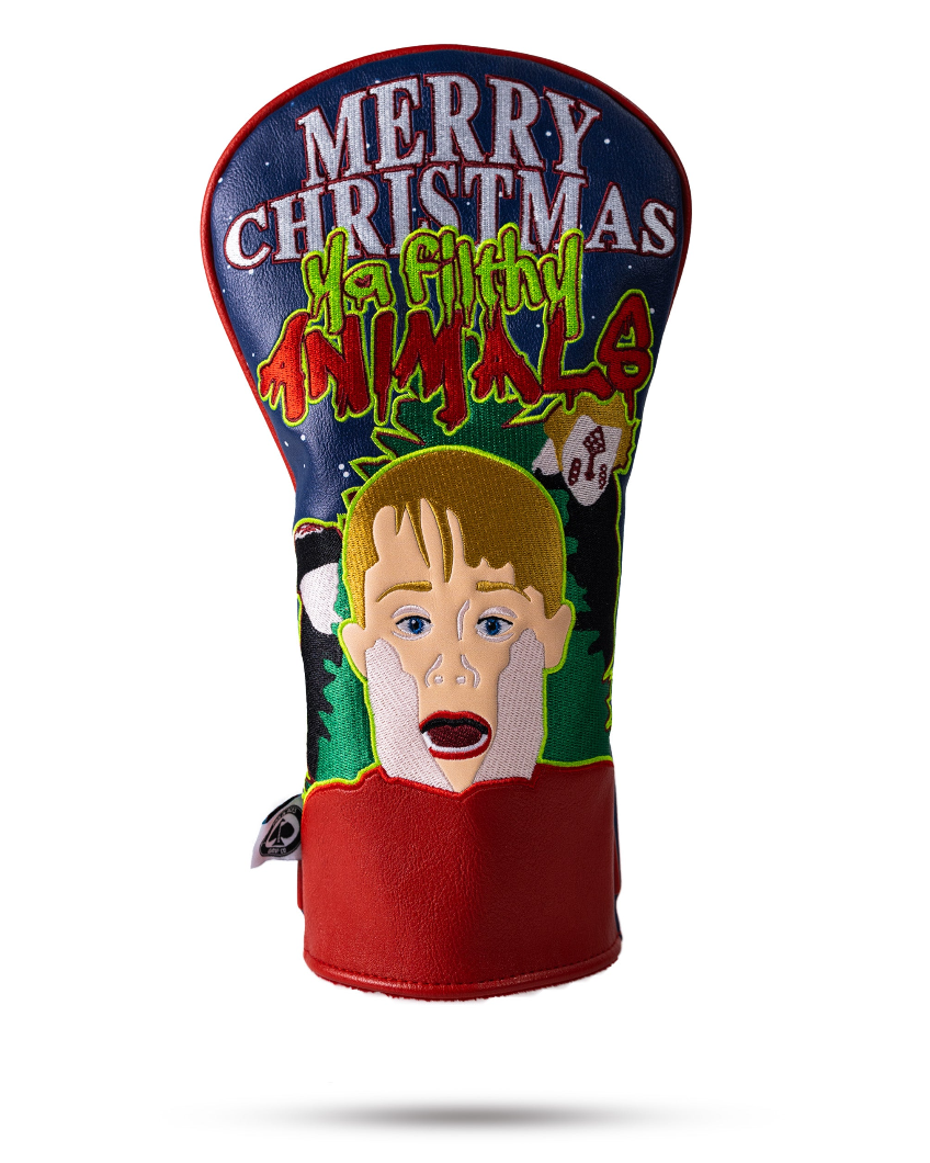 Bold driver cover featuring a playful design with a cartoon face and "Merry Christmas" text, perfect for festive golfers.