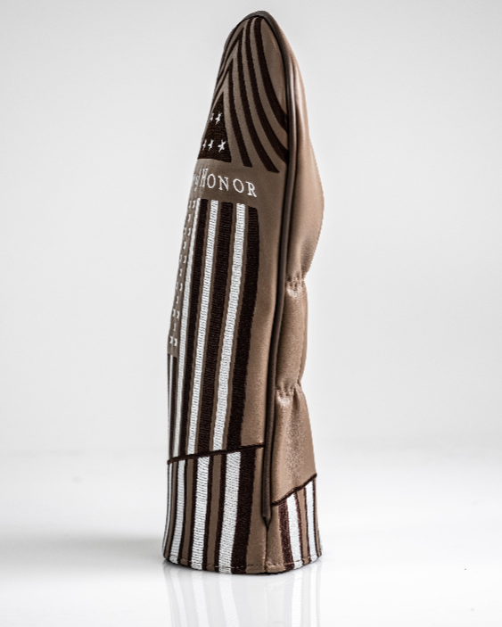 Bold Folds of Honor 2.0 driver cover featuring a sleek design with stripes and a prominent logo for stylish golf protection.