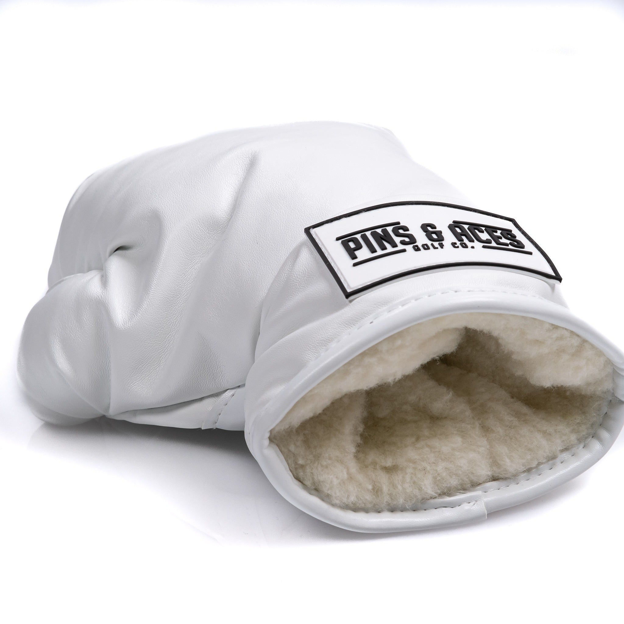 White boxing glove driver cover for golf clubs, featuring a sleek design and quality material.