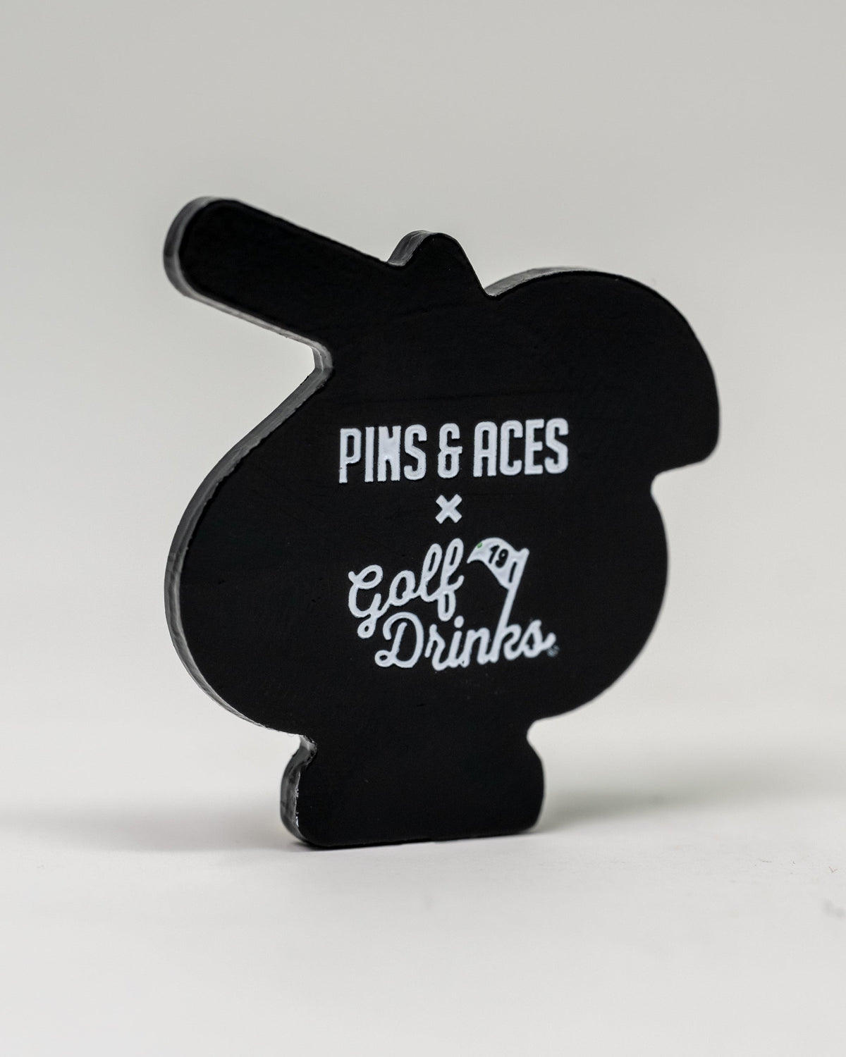 Transfusion Spade Ball Marker featuring a playful spade design with Pins & Aces and Golf Drinks branding.