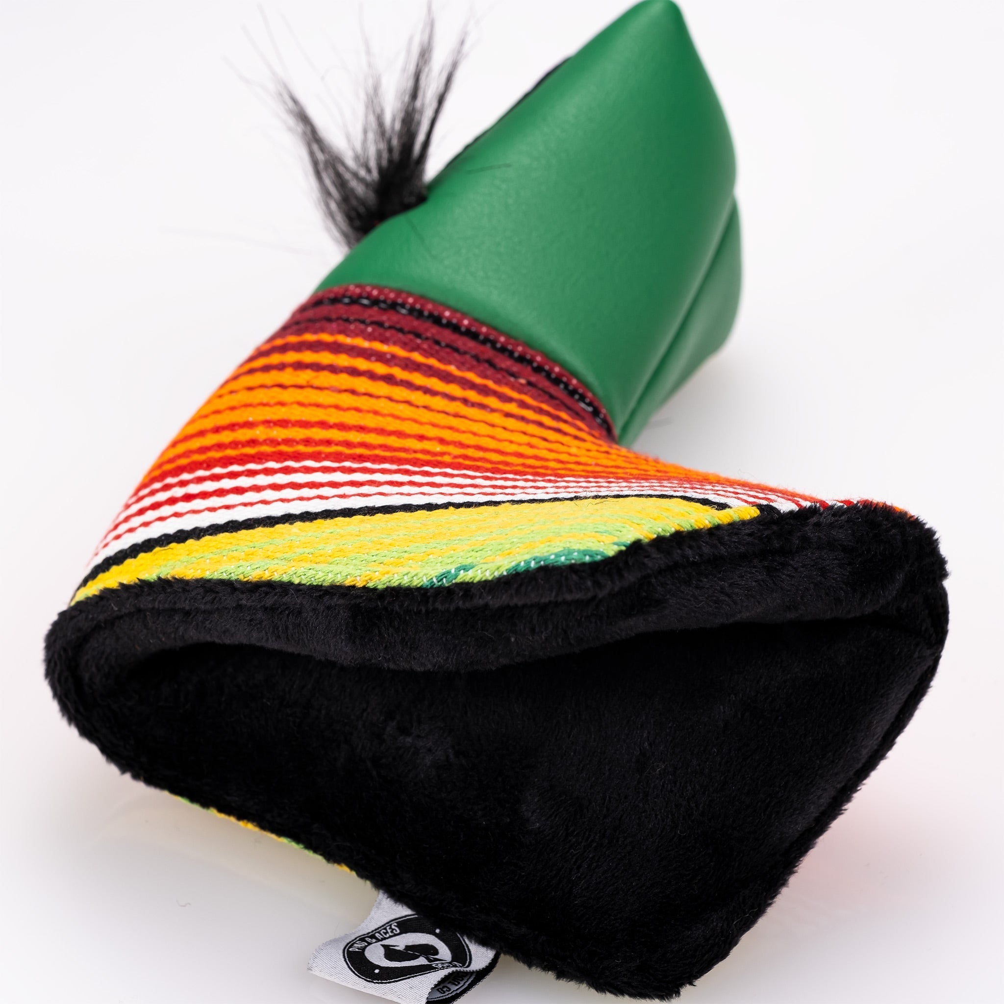 Bold green putter cover featuring a mustache sugar skull design with vibrant striped patterns and a soft black lining.