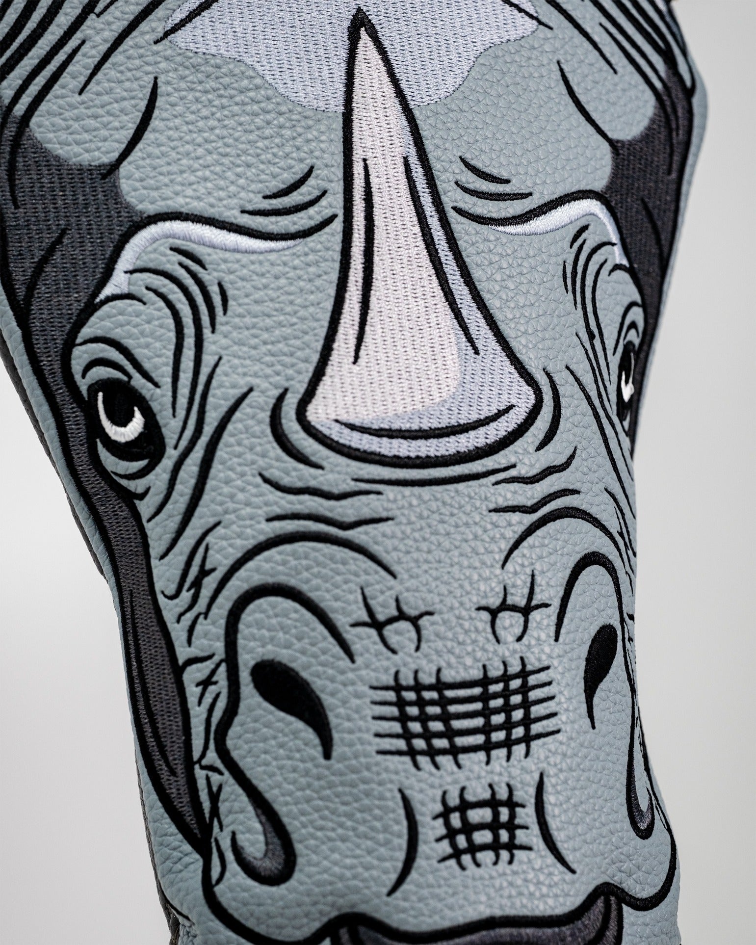 Bold Rhino Driver Cover featuring a detailed rhinoceros design, perfect for golfers wanting to make a statement on the course.