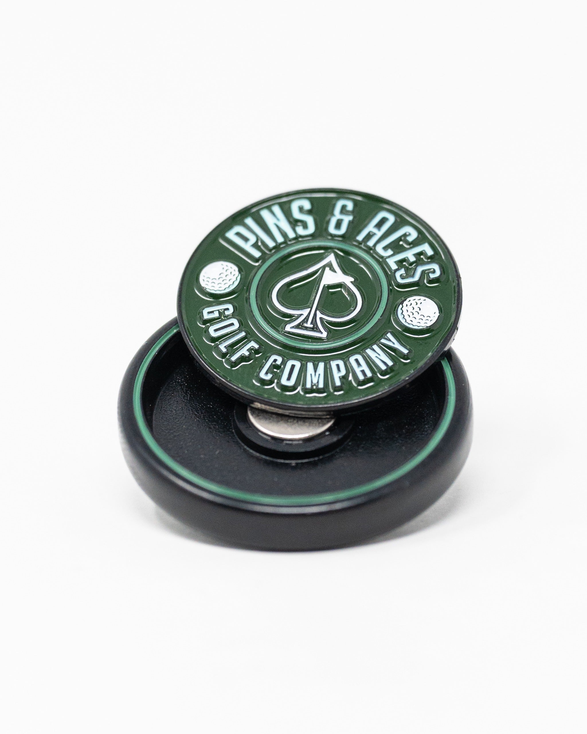 Green Pop Out Medallion Ball Marker featuring the Pins & Aces logo, designed for stylish and functional golf play.