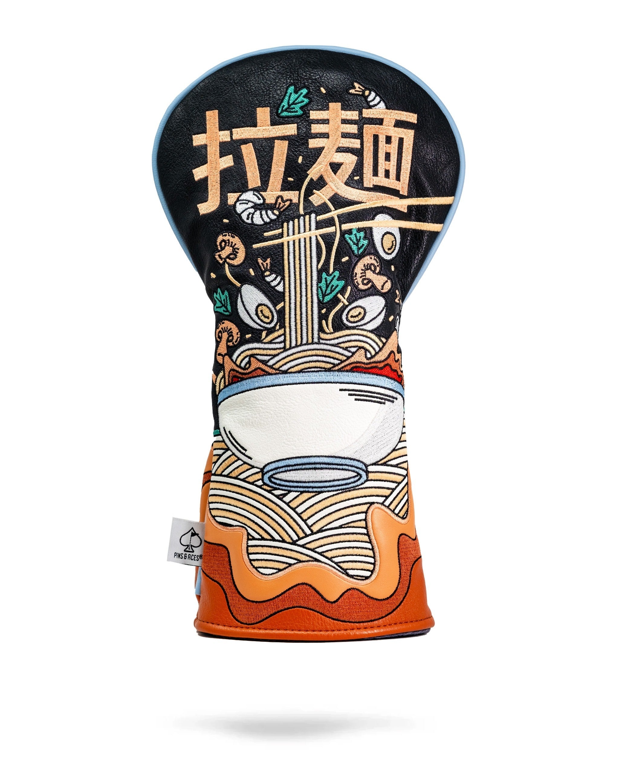 Bold ramen-themed driver cover featuring vibrant graphics of noodles and a bowl, perfect for unique golf style.