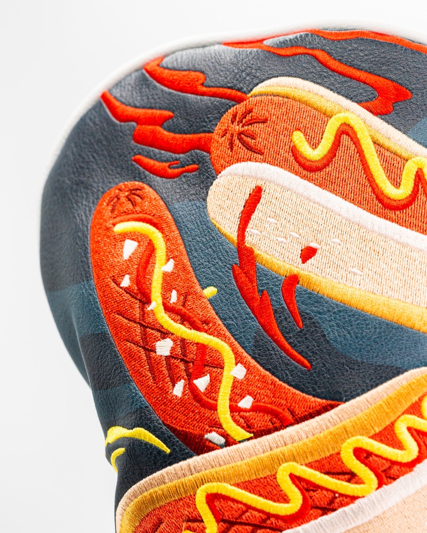 Bold driver cover featuring vibrant hot dog graphics and playful colors, perfect for golfers looking to stand out.