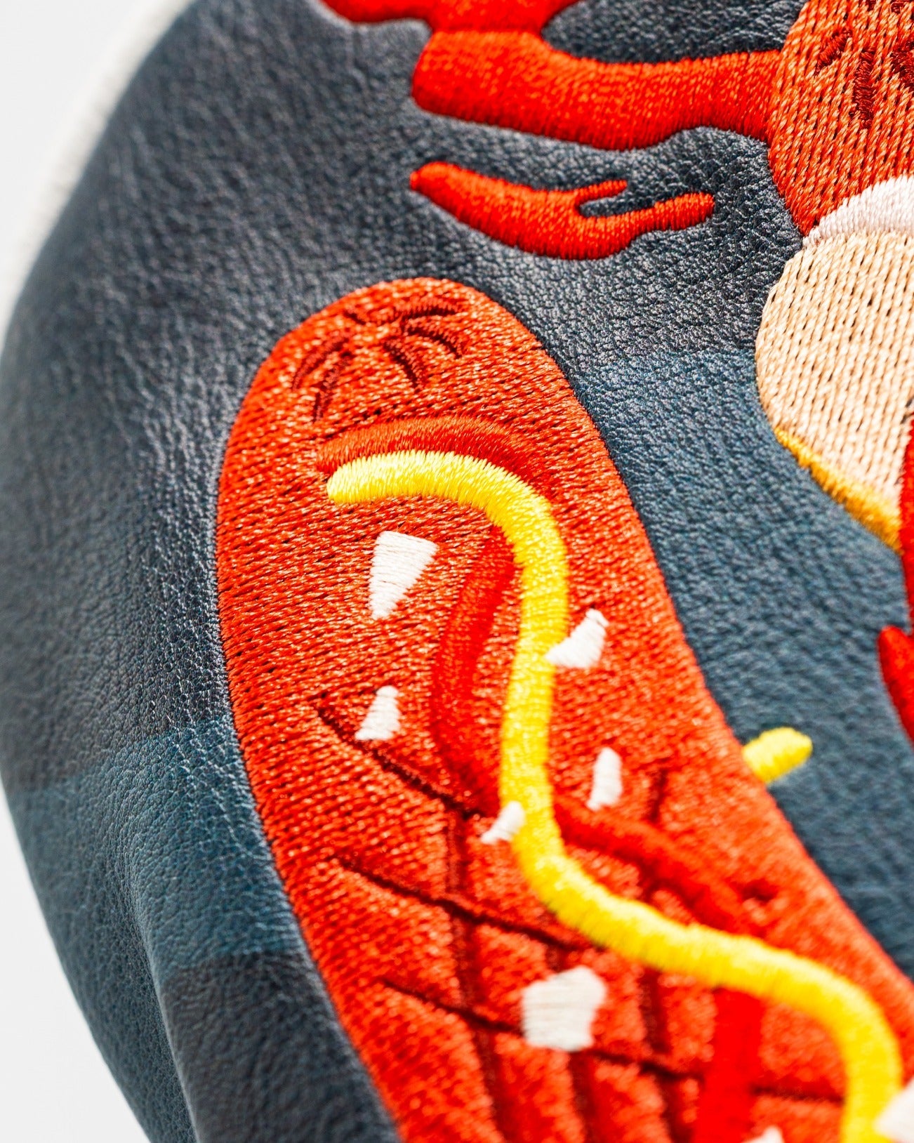 Bold driver cover featuring a vibrant hot dog design with colorful embroidery, perfect for golfers who want to stand out.