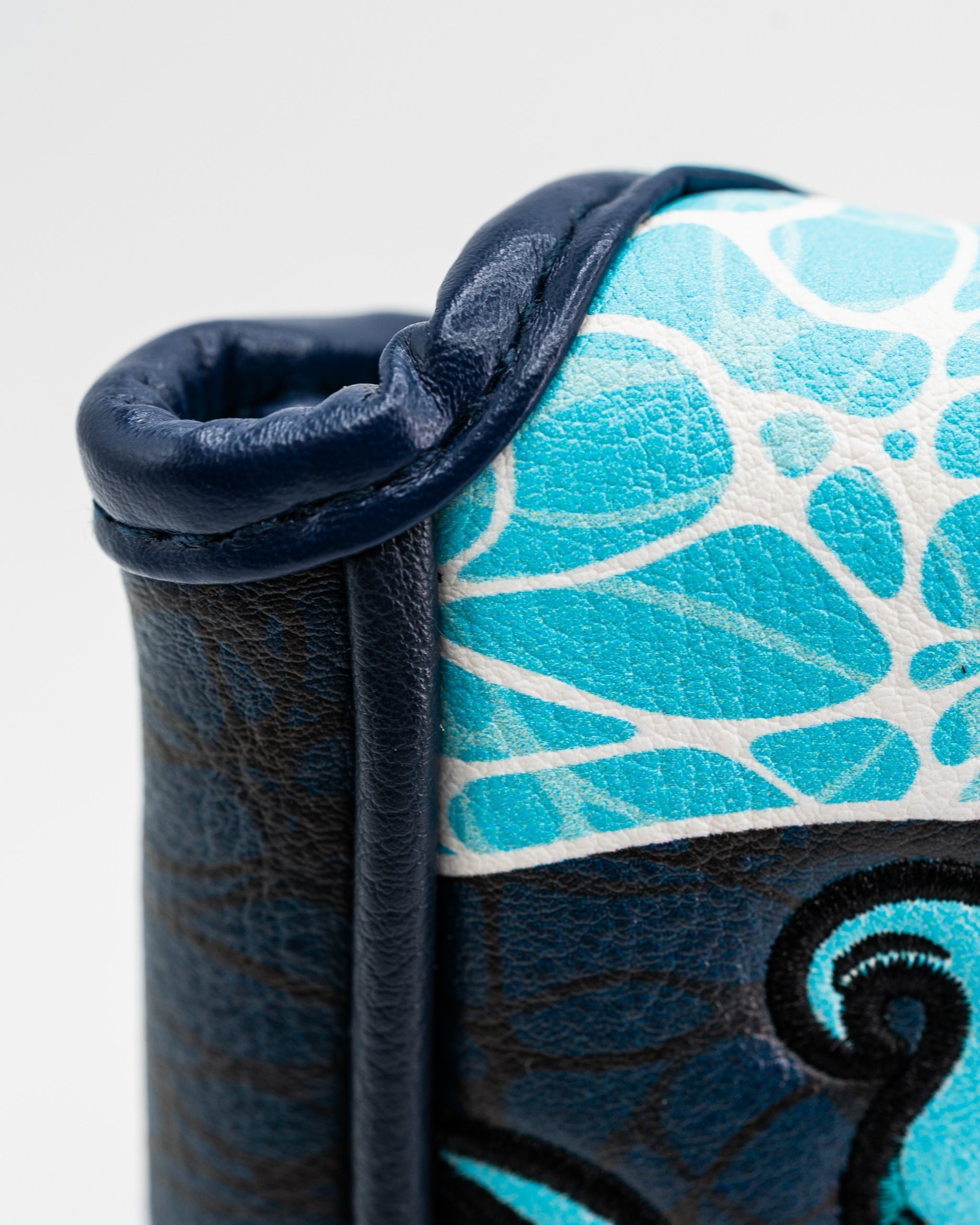 Bold Kraken mallet putter cover featuring vibrant blue and white designs, perfect for golfers seeking unique style on the course.