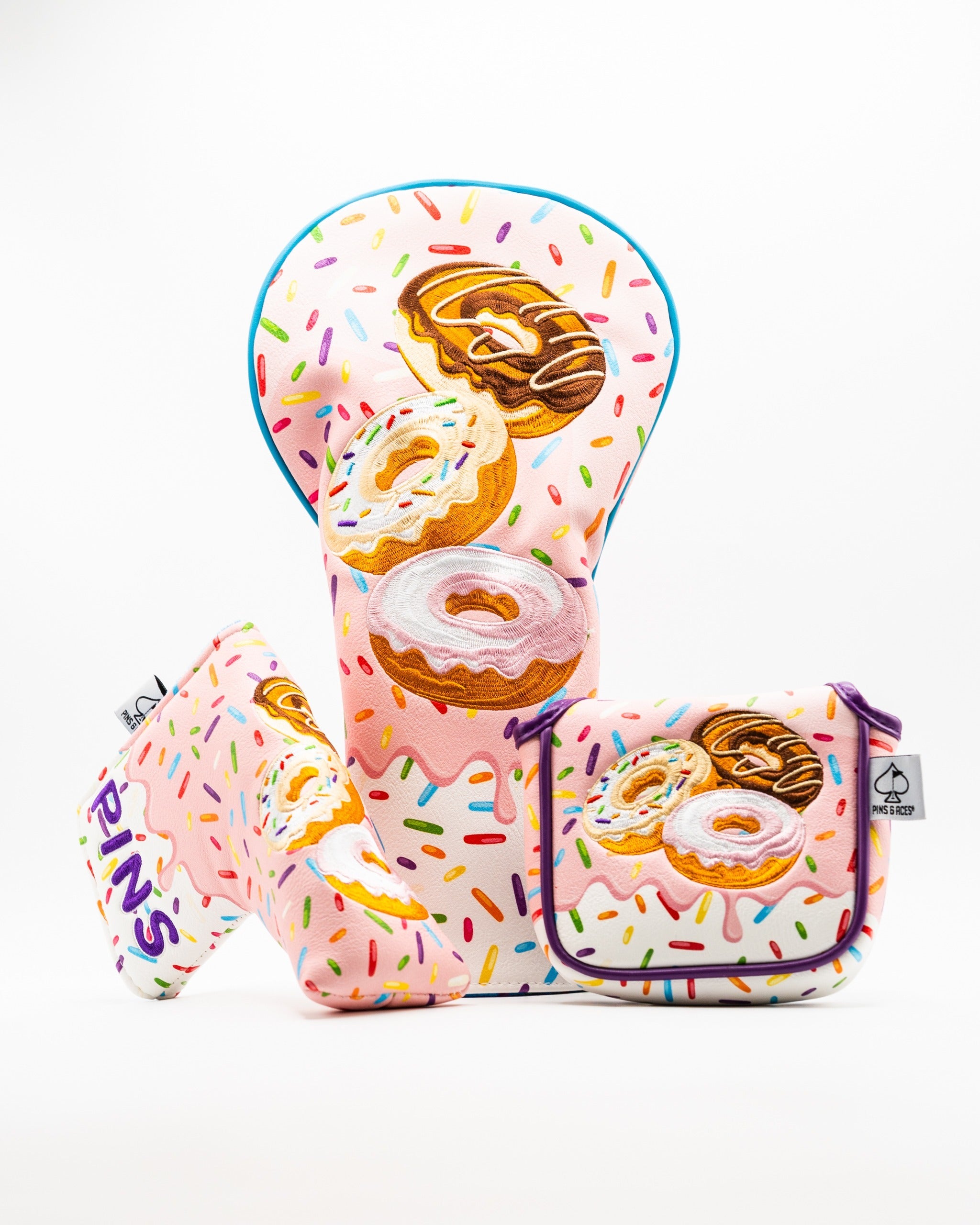 Colorful blade putter cover featuring a donut design with sprinkles, perfect for golfers wanting to add flair to their game.