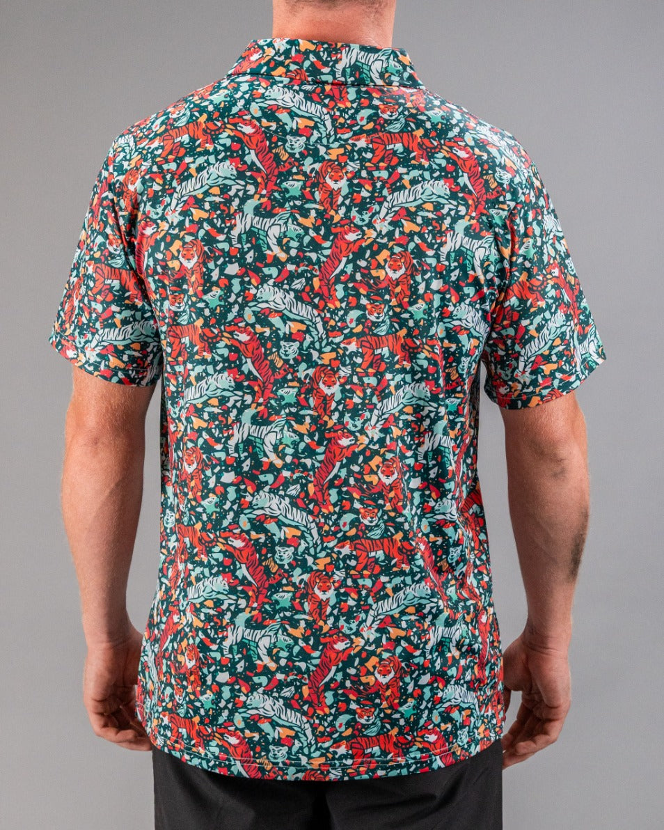 Bold teal golf shirt featuring a vibrant tiger and floral pattern, designed for golfers who want to stand out on the course.