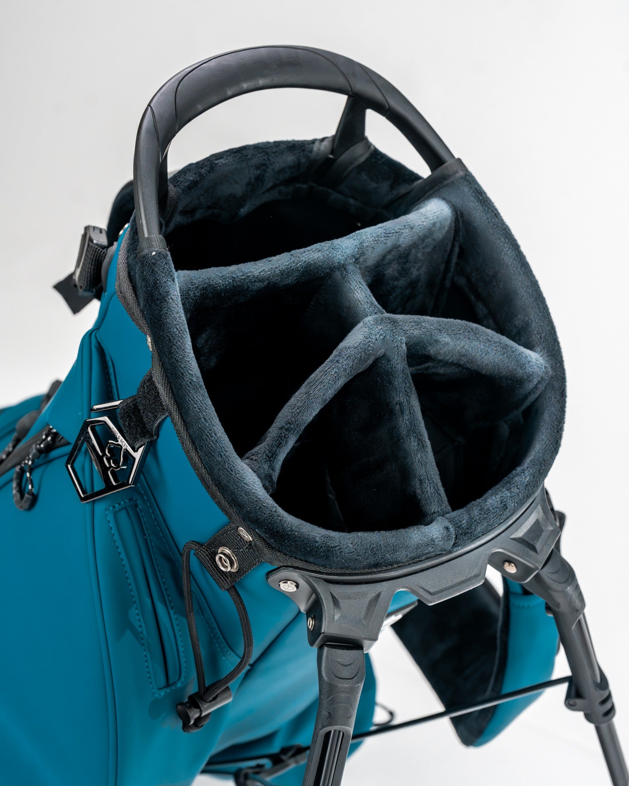 Top view of the Player Preferred Golf Bag in Sea Strike, featuring a spacious, padded interior with club dividers.