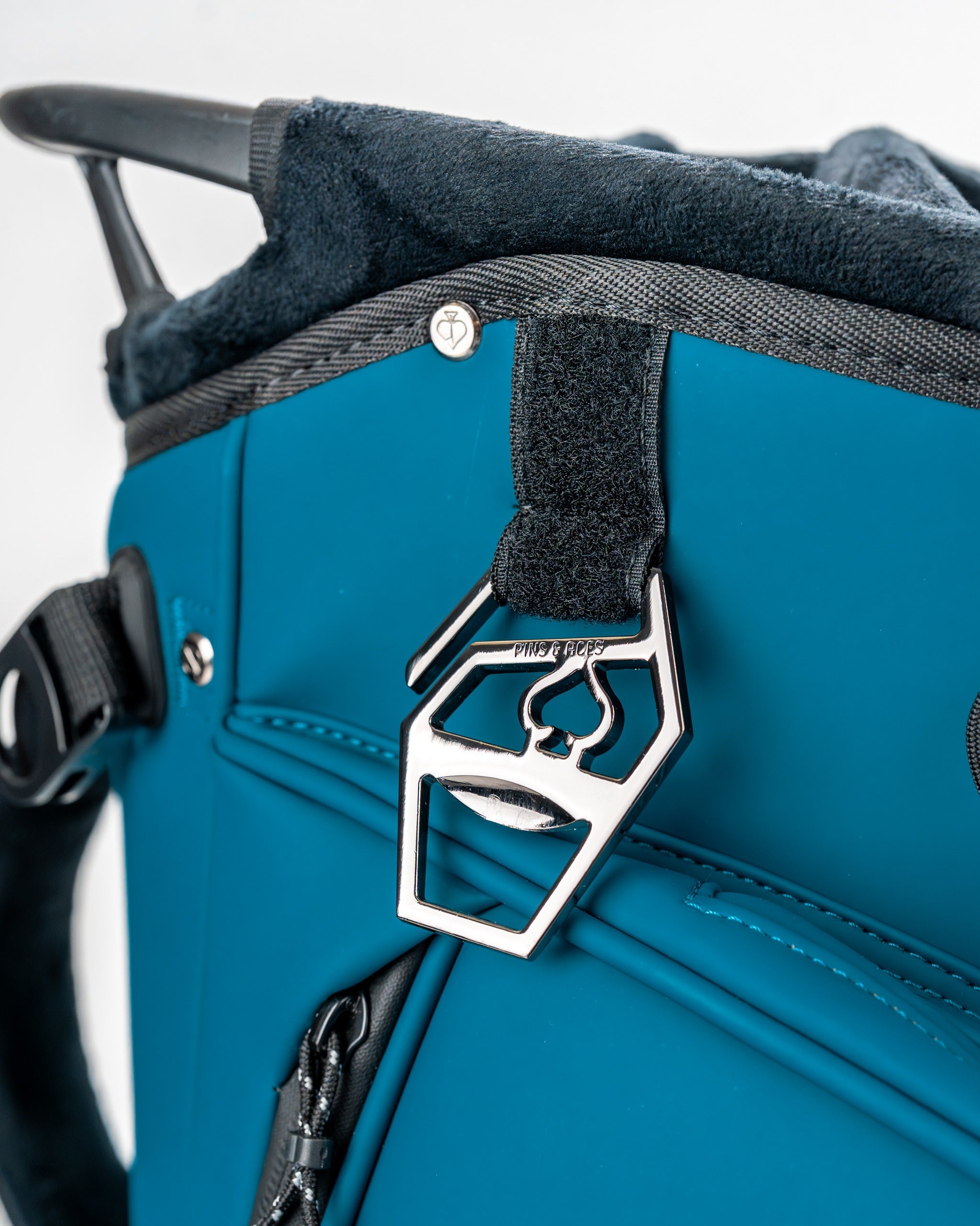Close-up of the Player Preferred Golf Bag in Sea Strike, showcasing a sleek design and durable attachment clip.