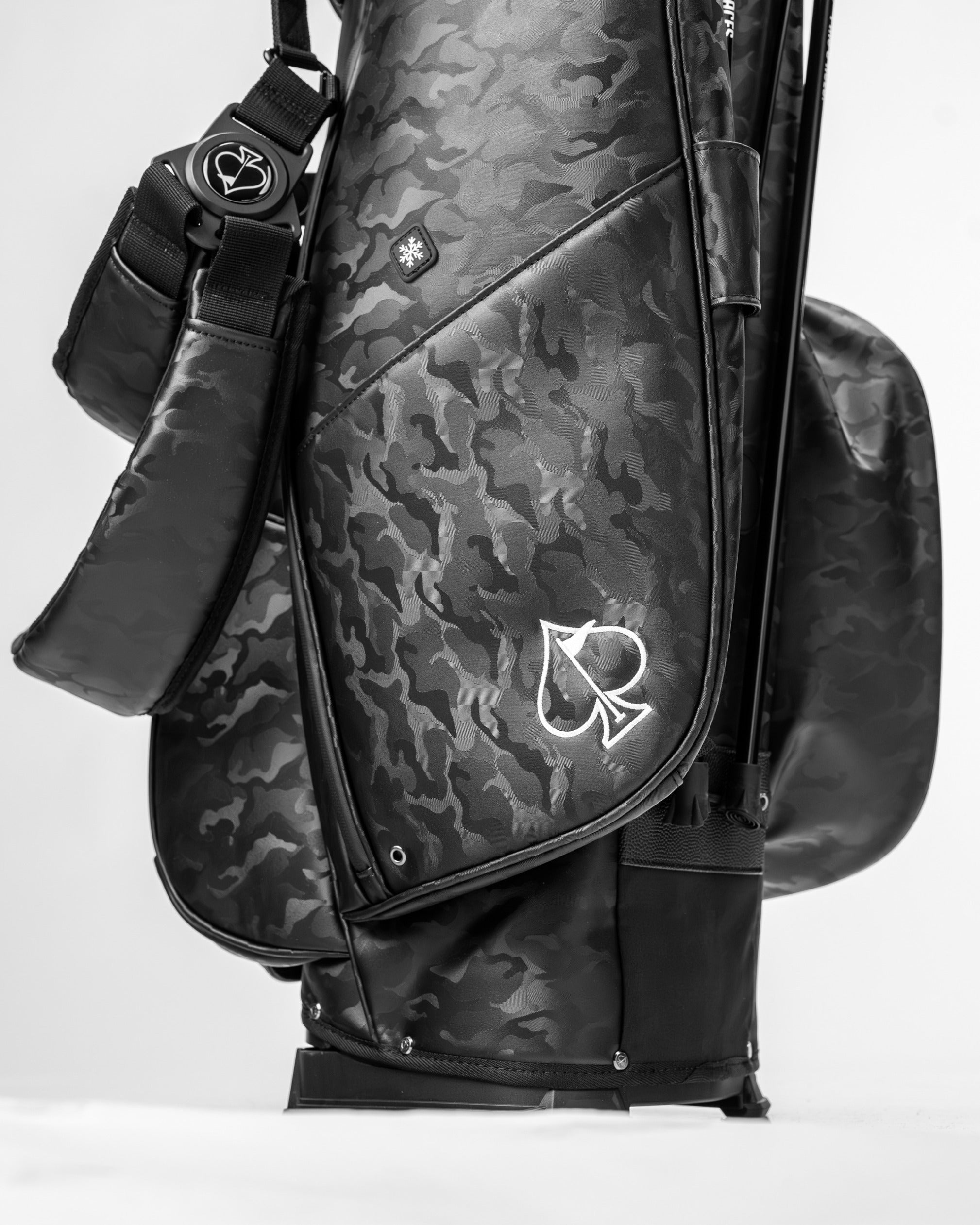 Player Preferred Golf Bag in black camo features a sleek design with a prominent logo, perfect for stylish golfers.