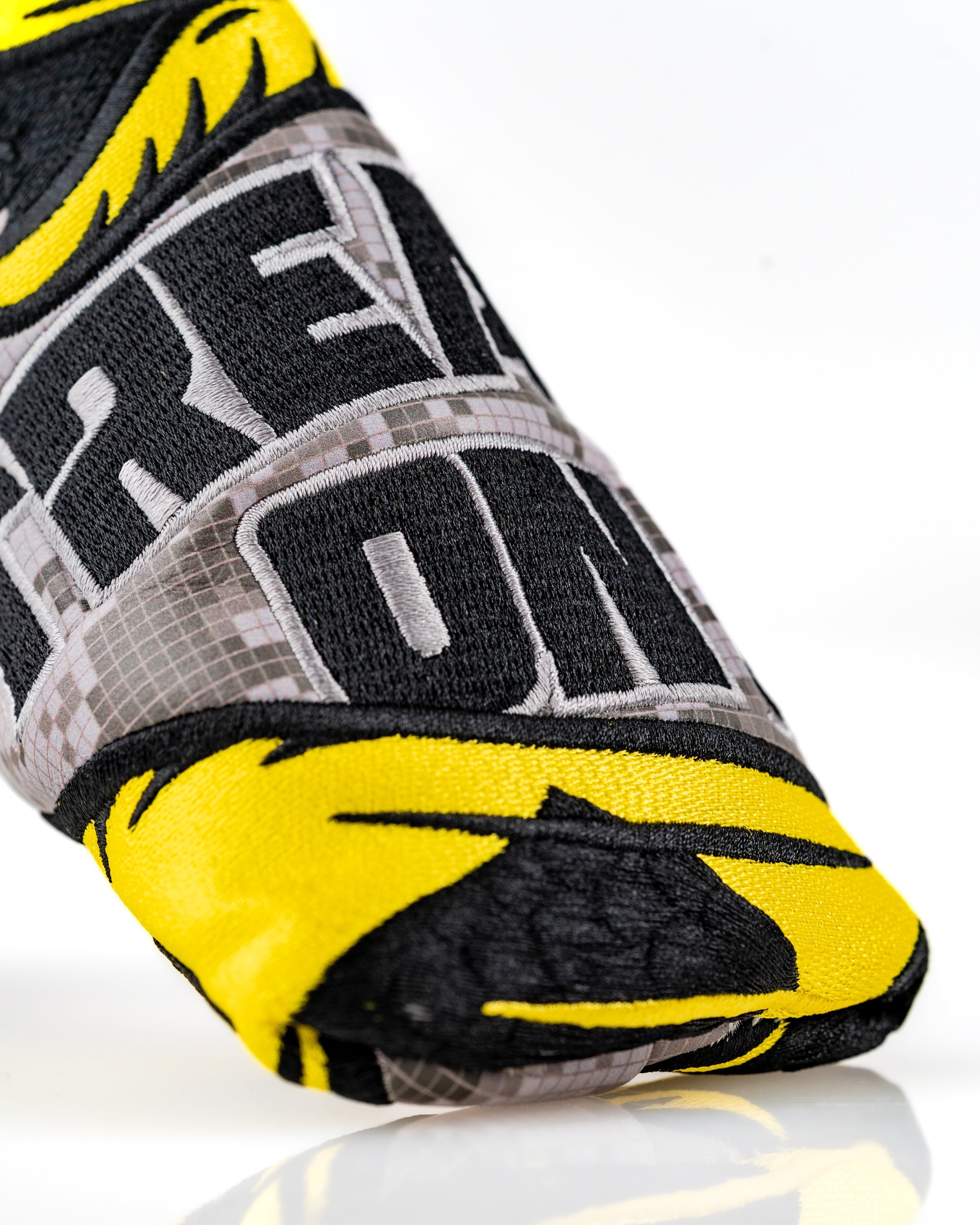 Bold Don't Tread On Me 2.0 blade putter cover featuring striking yellow and black design for standout golf style.
