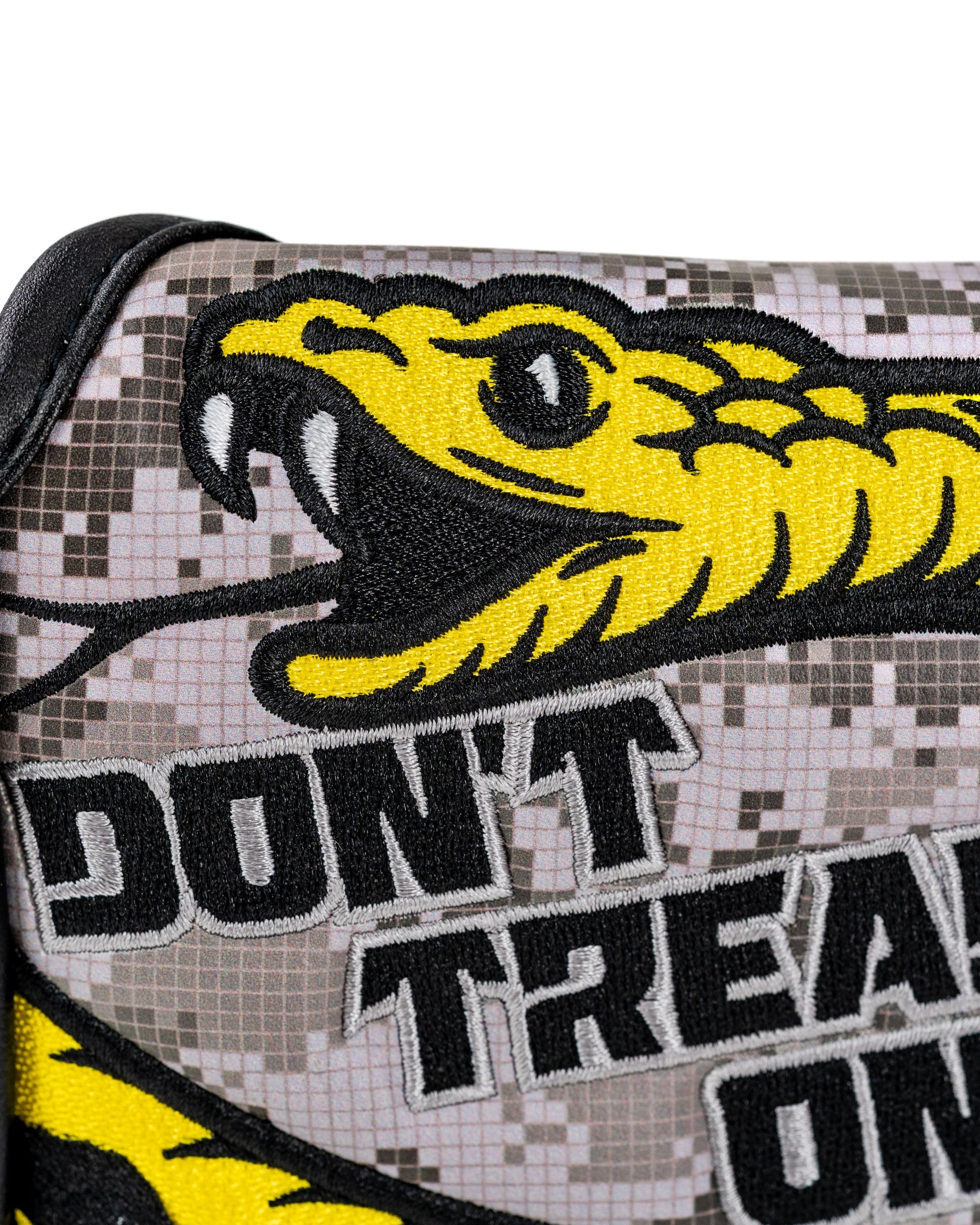 Bold mallet putter cover featuring a striking yellow snake design and "Don't Tread On Me" text for standout golf style.