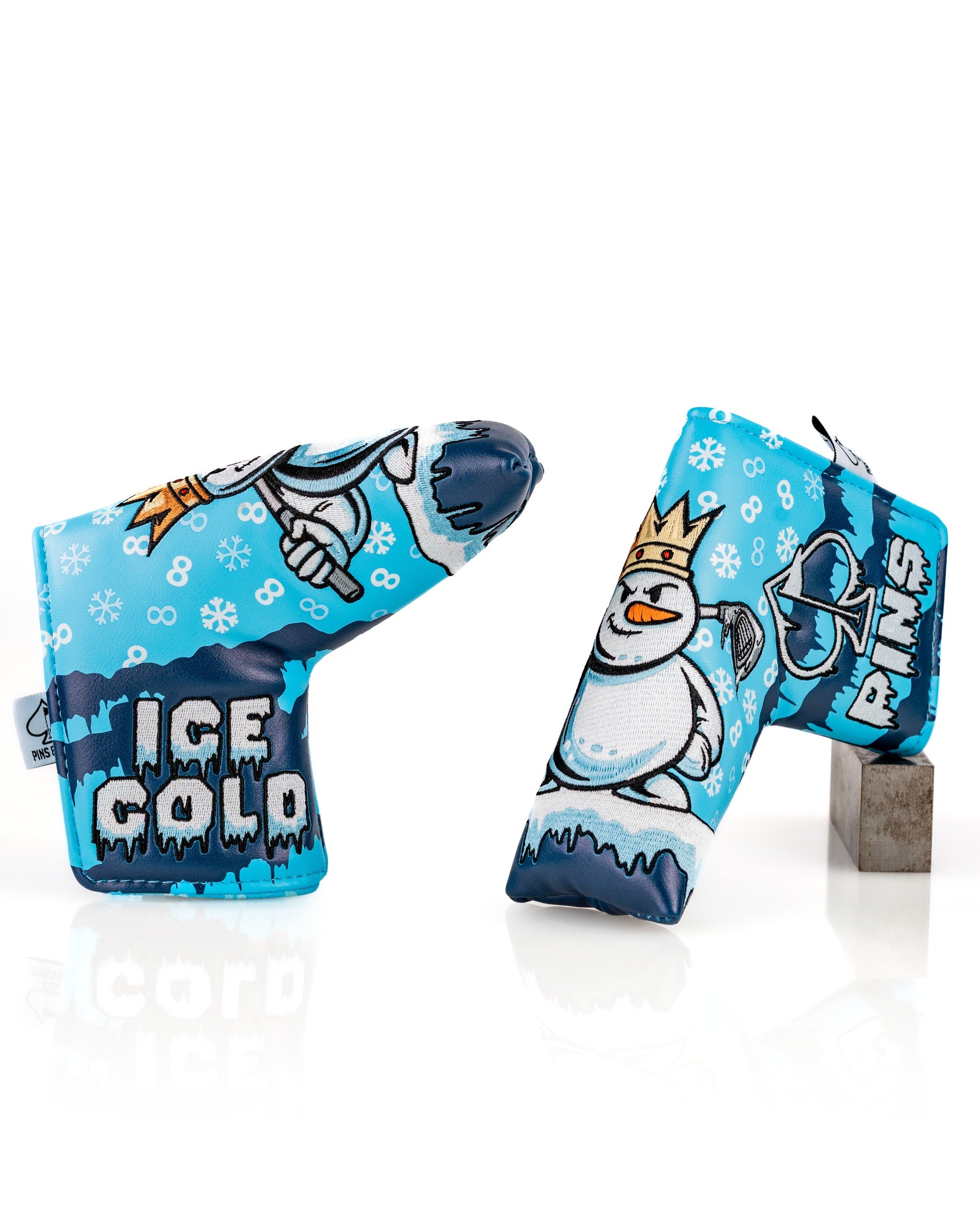 Snowman blade putter cover featuring a playful design with icy blue tones and cartoon snowman graphics for golfers.
