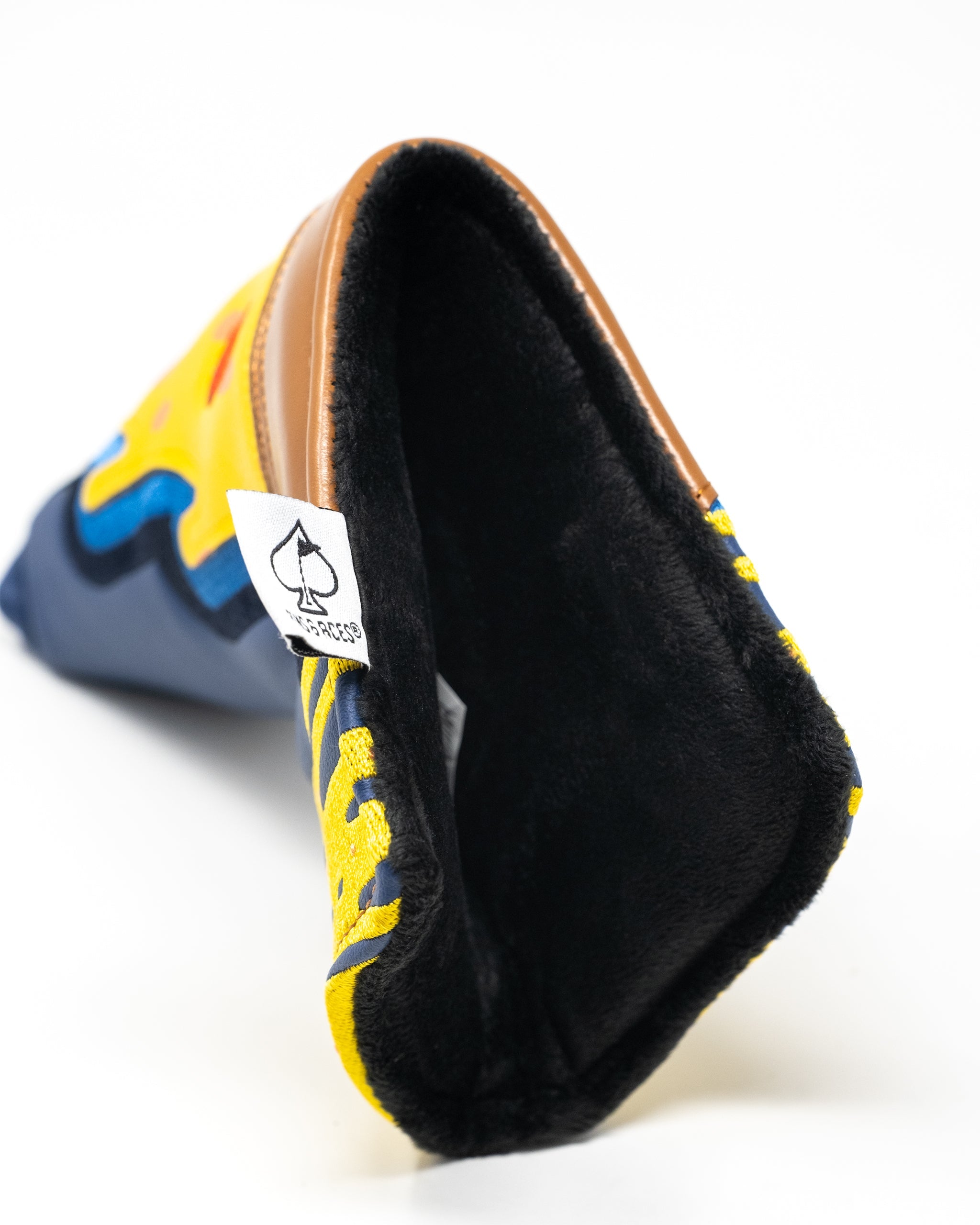 Alt text: Pizza-themed blade putter cover featuring colorful graphics ideal for golf enthusiasts.